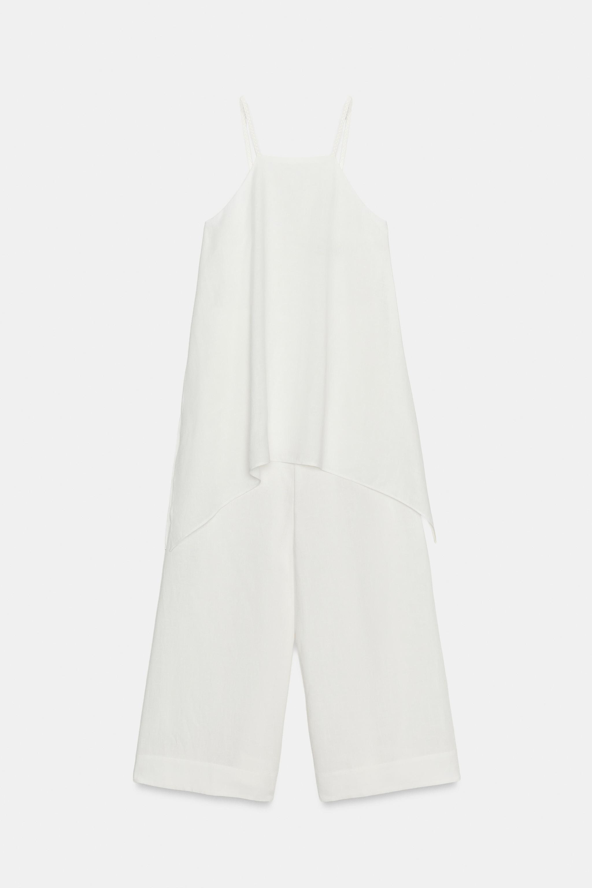 Model height: 181 cmJumpsuit crafted from ramie. Halter neckline with spaghetti straps. Hidden si... | Zara UK