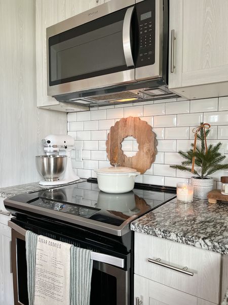 Wooden wreath board back in stock! I hung it behind my stove last year and loved the warmth it added to my kitchen! Used double sided velcro command strips to attach it to the backsplash. 

#LTKHoliday #LTKSeasonal