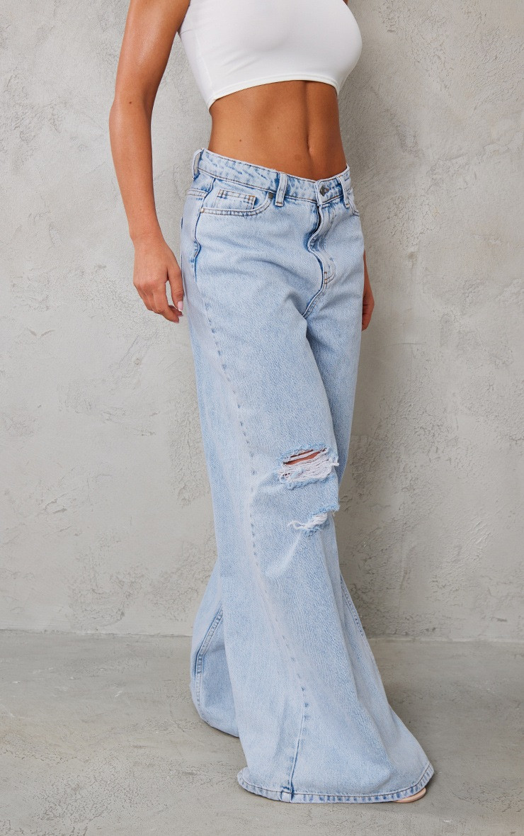 Vintage Wash Knee Rip Extreme Wide Leg Jeans | PrettyLittleThing US