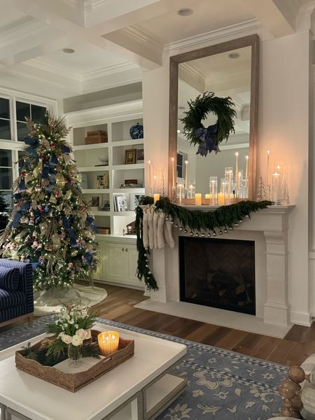 Christmas tree, Christmas mantel and holiday living room decor with blue velvet ribbon and Norfolk pine garland.

#LTKSeasonal #LTKhome #LTKHoliday