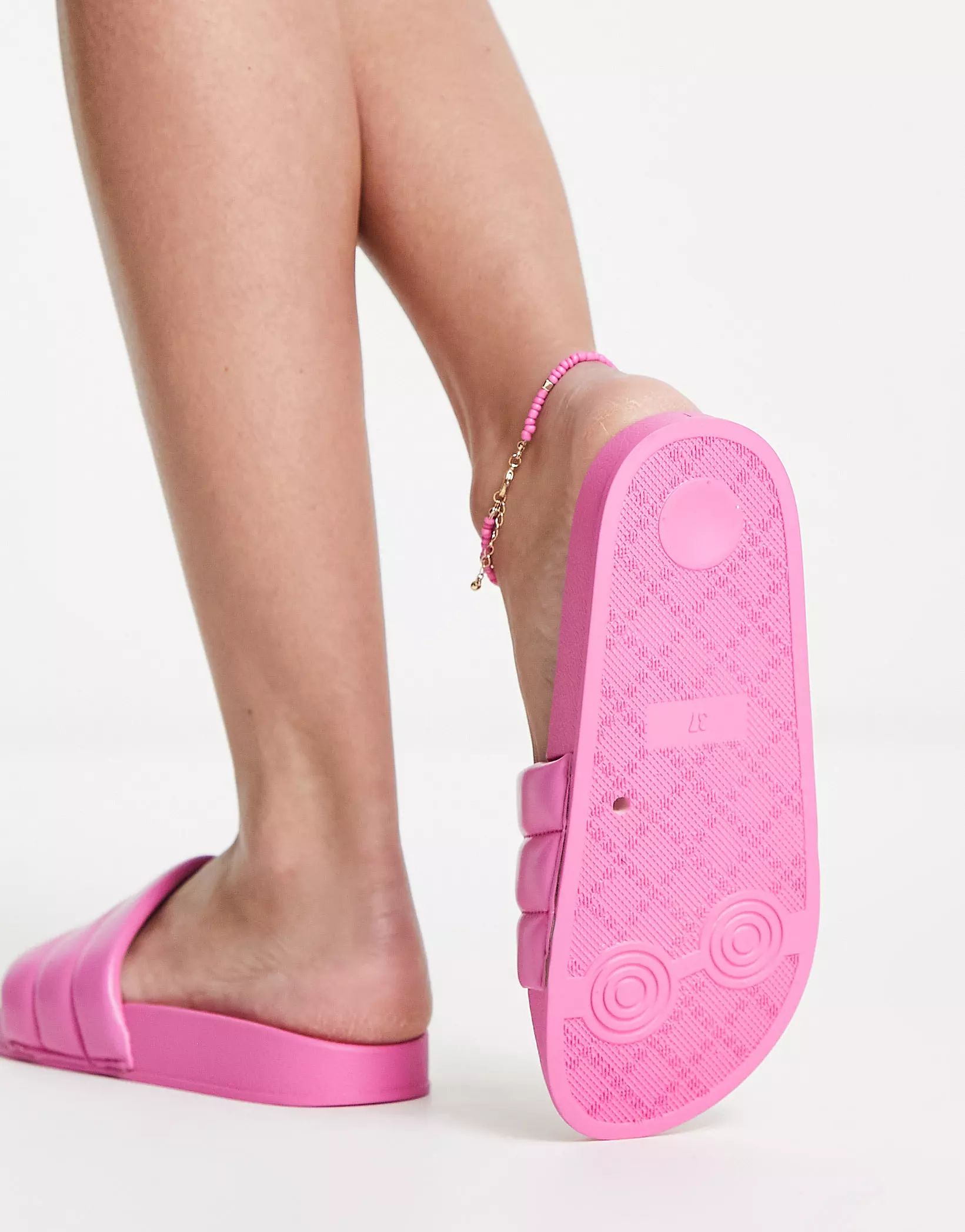 Truffle Collection padded pool slides in pink | ASOS (Global)