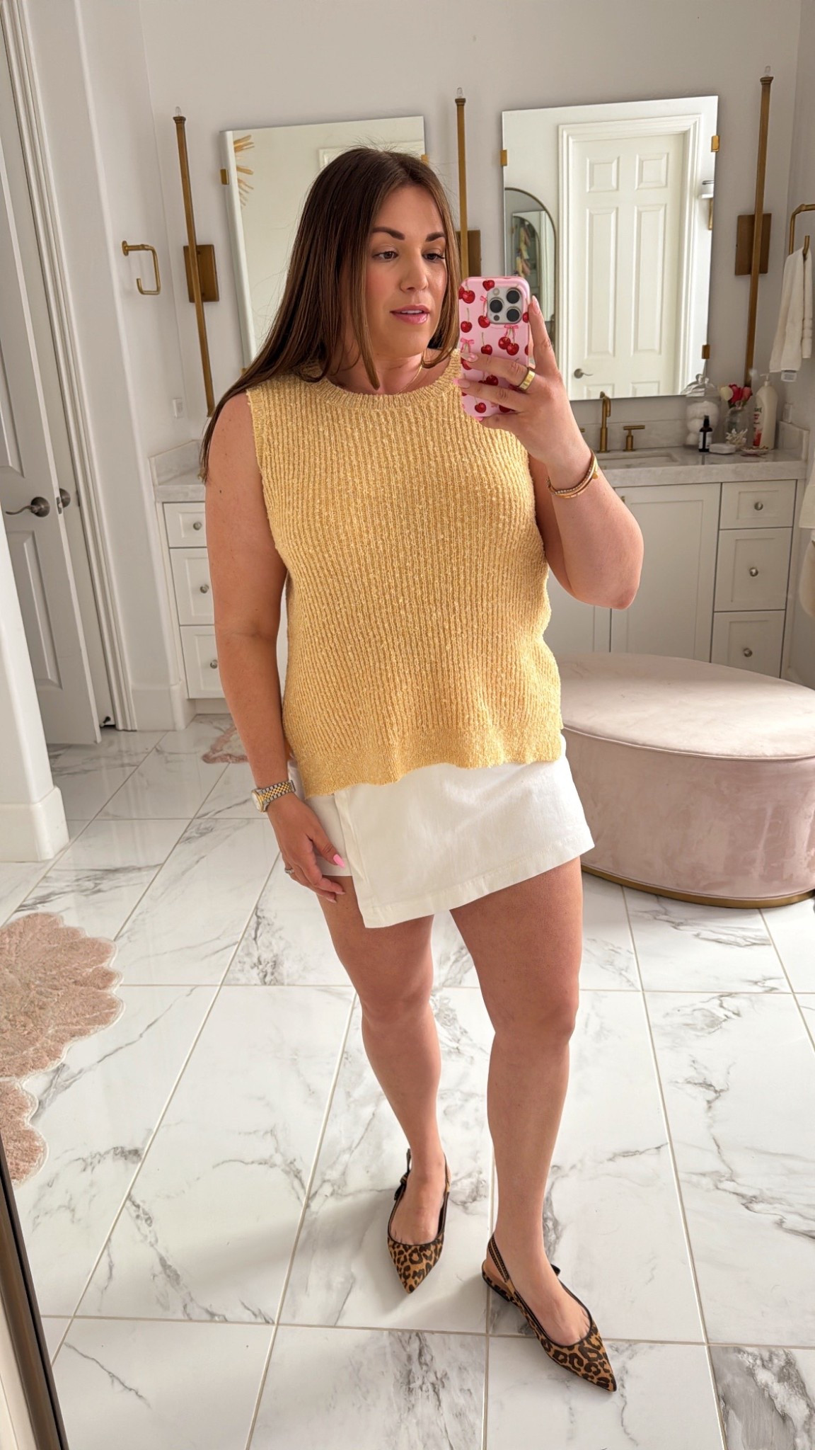 curvy midsize spring style! wearing size large in yellow sweater tank and size xl in white denim skort 

#LTKSpringSale #LTKFindsUnder50 #LTKMidsize
