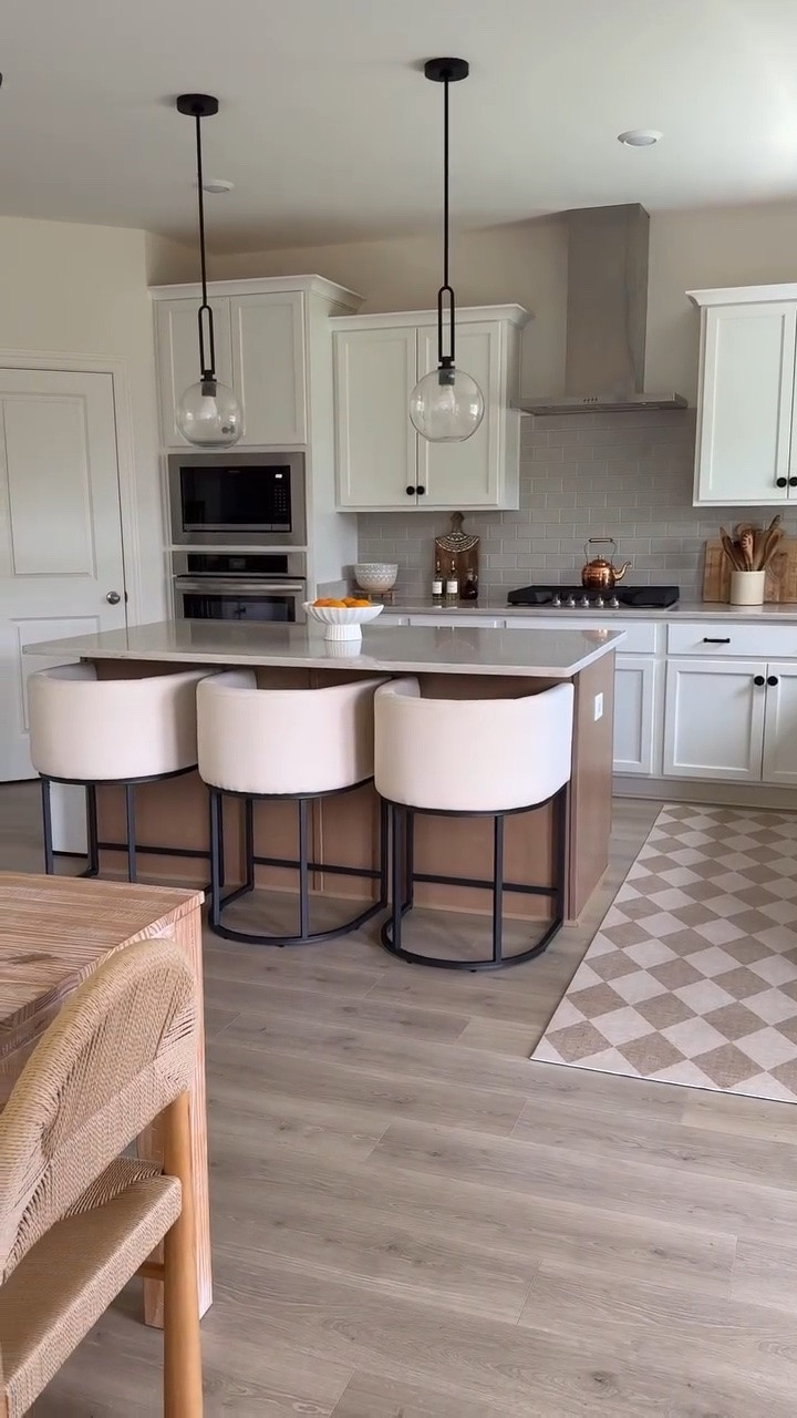 These cream linen counter stools with a sleek black base are that perfect balance of elevated style and everyday function for our kitchen island. They completely transformed the look of the space while still being super practical for daily use. Even better—they come in multiple color options to fit any aesthetic, and they’re currently on sale.

#LTKHome