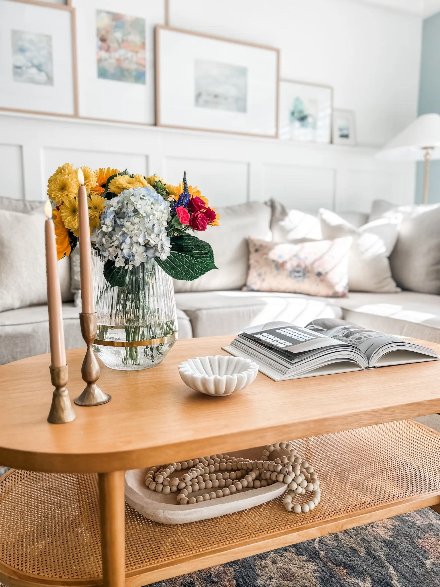 New Spring home decor in the Living room!
Coffee table decor, large luxe glass hurricane holder, Studio McGee glass candle holder, clear vase, gold candle holders, flameless taper candles in color beige, taper candles with gently flickering LED, marble bowl, marble dish, ruffle bowl, marble ruffle bowl, coffee table book, light wood coffee table, oval coffee table with rattan shelf, rattan coffee table, living room decor, Spring throw pillow, gallery wall, poster frame, Spring art print, bead garland. 

#livingroom #home #amazon

#LTKfindsunder50 #LTKhome #LTKstyletip