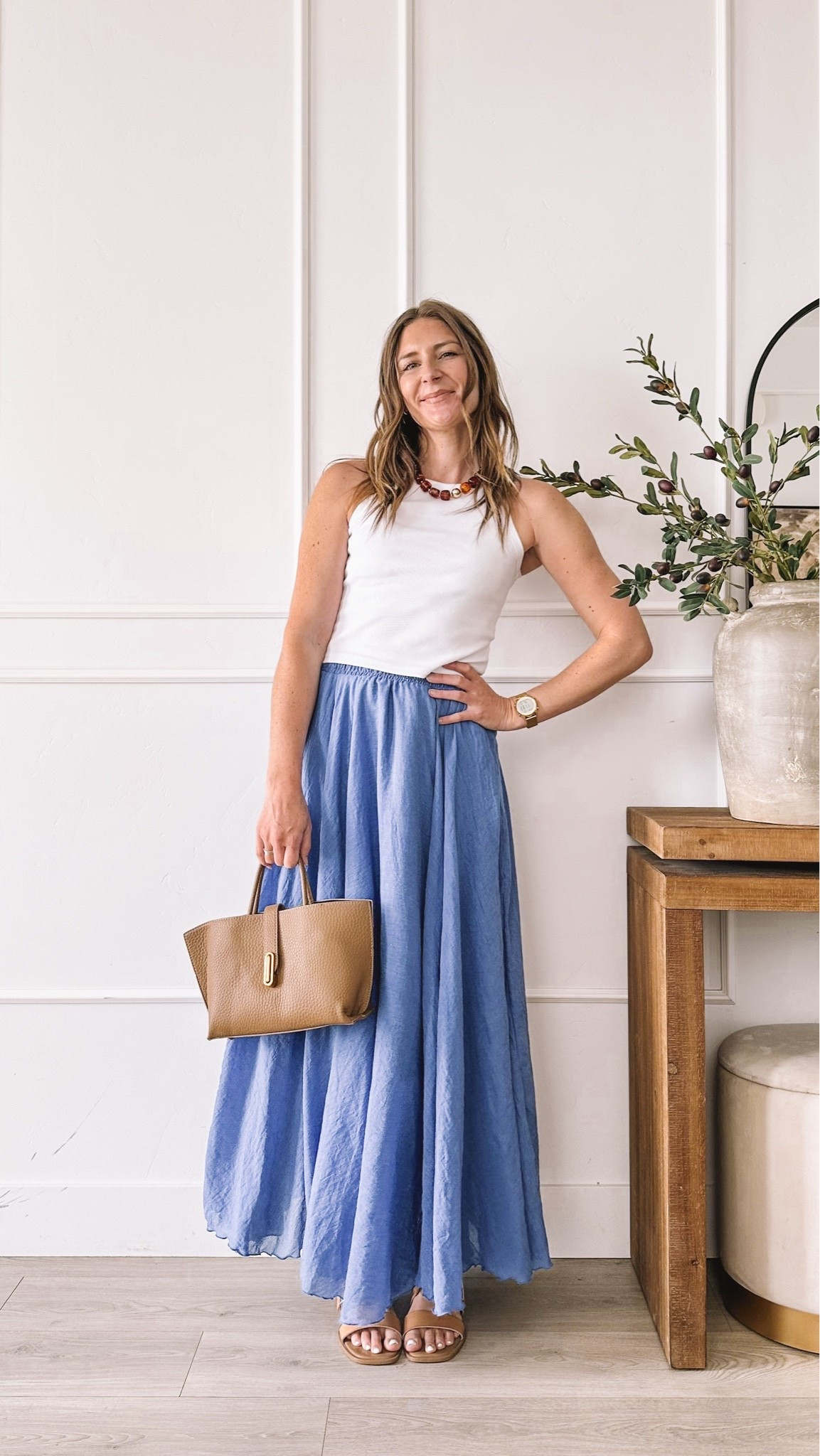 This entire outfit is an Amazon find and it’s my favorite easy summer look right now. The blue maxi skirt has the dreamiest flowy movement and pairs perfectly with a simple white tank, a beaded necklace, a structured tan bag, and tan sandals, all from Amazon too. It’s the kind of everyday outfit that looks elevated with zero effort, perfect for summer dinners, vacation, or just feeling put together at school pickup. Tap to shop the skirt, the tank, the necklace, the bag, and the sandals, everything is linked here for you.

#LTKootd #LTKgrwm #LTKmomlife