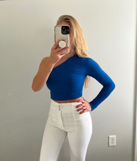 One shoulder top 
Spring outfit ideas 
Free people flare jeans 
White flare jeans 
Revolve finds 
Vacation outfit 
Spring break 
Summer outfit 
Superdown 

#LTKFind #LTKstyletip #LTKtravel