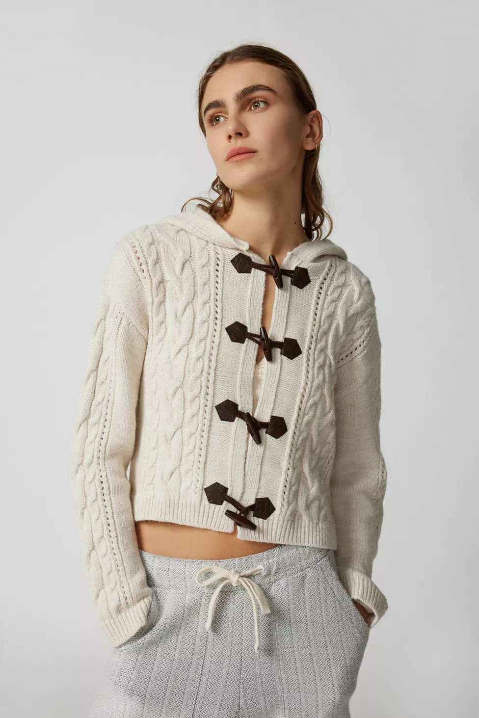 UO Quinn Cable Knit Hoodie Sweater | Urban Outfitters (US and RoW)