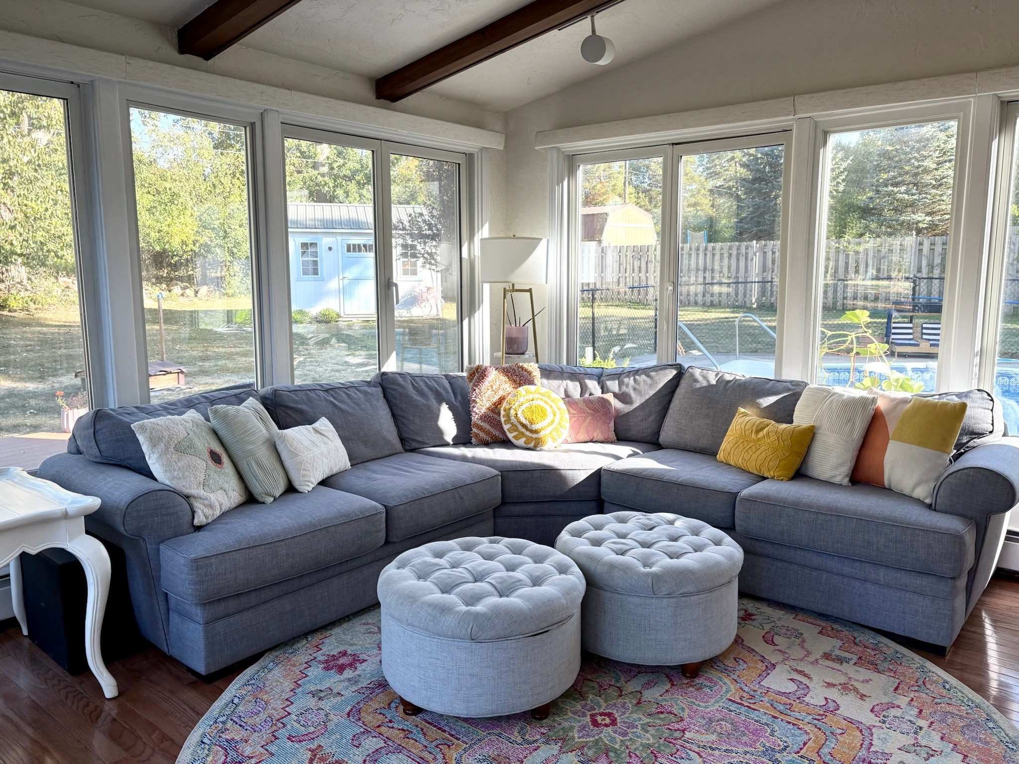 We kept our sunroom decor minimalist, while sprinkling in happy, subtly bright colors. We especially love our rug and storage otttomans that have been hiding our magic track and marble run parts! 

#LTKHome #LTKKids #LTKFamily