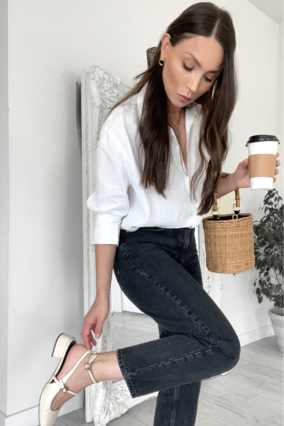 Parisian style outfit with linen shirt, black jeans and bucket bag 

White linen shirt outfit, black mom jeans, mom jeans outfit, teacher outfit, sling back shoes, Mary Jane shoes, Mary janes shoes 

#LTKFind #LTKshoecrush #LTKworkwear