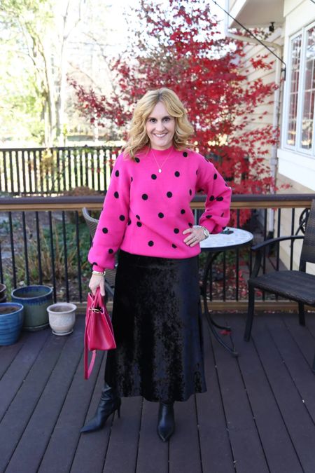 Go for a non-traditional color palette this holiday season! 🩷🖤 I adore this polka dot sweater and velvet maxi skirt combo. 

#LTKfindsunder100 #LTKHoliday #LTKstyletip