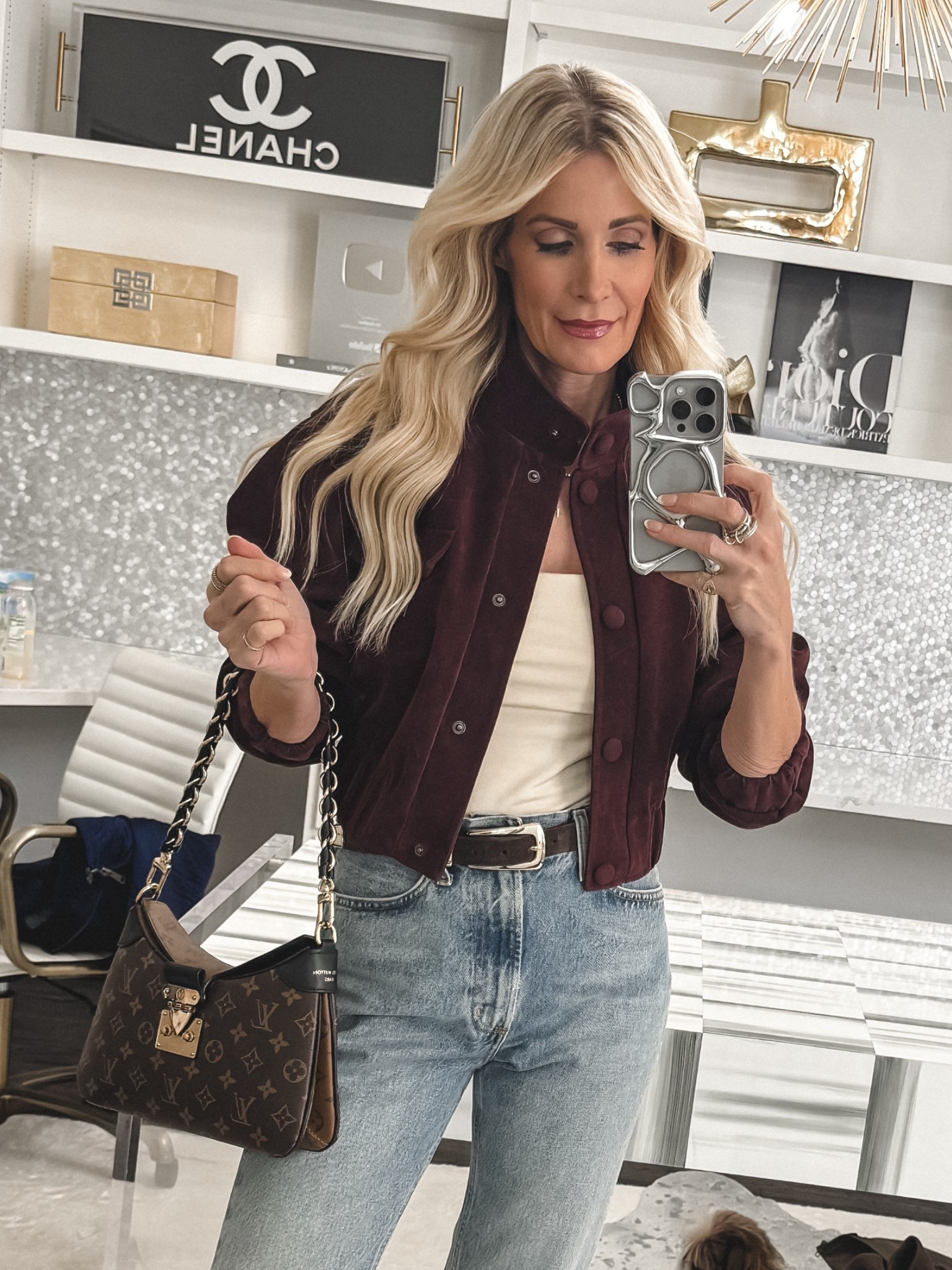 Hands down one of the coolest jackets I’ve found lately 😍 This burgundy suede bomber jacket is such a statement piece, and that high collar detail makes it feel super current for 2026. The cropped cut is so flattering because it hits right at the smallest part of your waist and instantly gives you that snatched shape. I’m wearing an XS in the jacket and a 24 in the jeans. 

 

#LTKSeasonal #LTKOver40 #LTKFindsUnder100