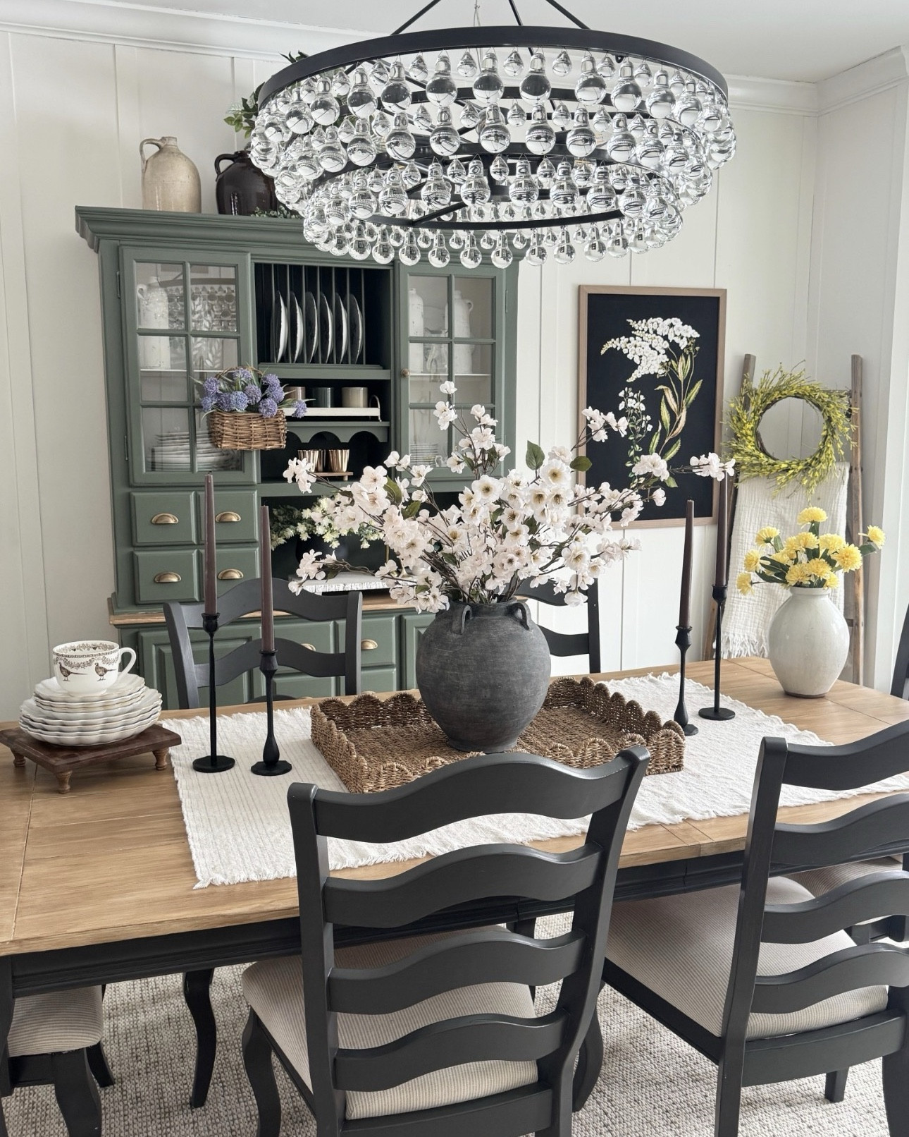 Current home styling and decor:

Cream apple blossom stems
Forsythia wreath
Woven scalloped rectangular tray
Vase with handles
Taper candles
Candle holders
Glass botanical ornament 
Pretty faux florals 
Textured vases
Square wooden checkered riser 
Cream scalloped plates
Pheasant coffee mug
Small lamp
Orla hand loomed rug
Spring florals

#LTKHome