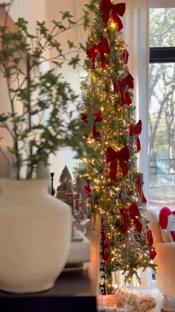 primary bedroom decor, traditional red + green. my tree is 10 feet slim, added some red bows and icicles! using the drapey garland on our bed frame and mixed in some twinkle lights  

#LTKHome #LTKHoliday #LTKWatchNow