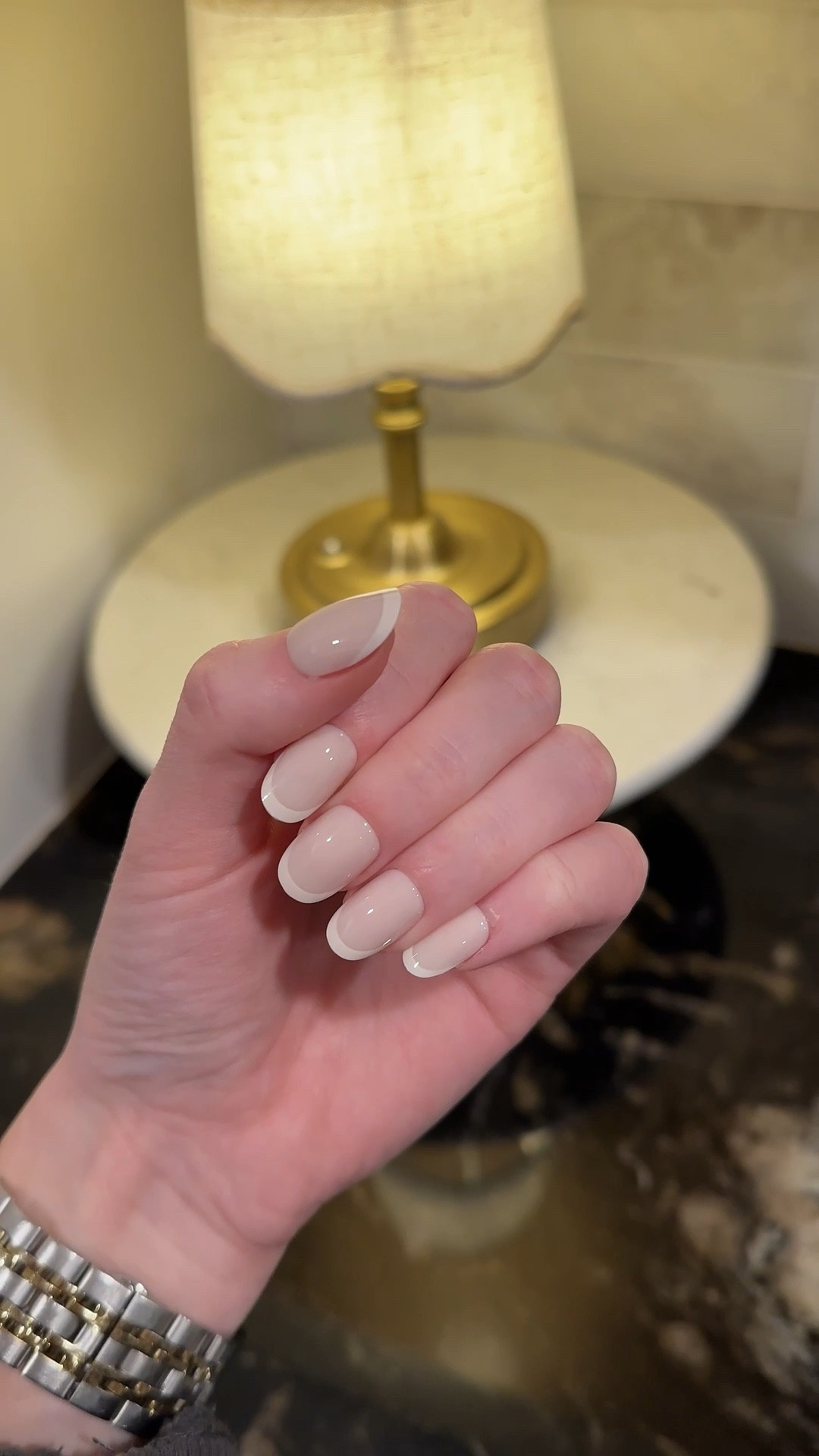 Olive and June instant press on manicure. Love the round shape with nude base  and cream tips for a monochromatic look! The length is perfect for elongating the fingers but not taking easy motion away 

Press ons, press on nails, French tips, fake nails, instant mani, press on mani 


#LTKselfcare #LTKValentine #LTKBeauty