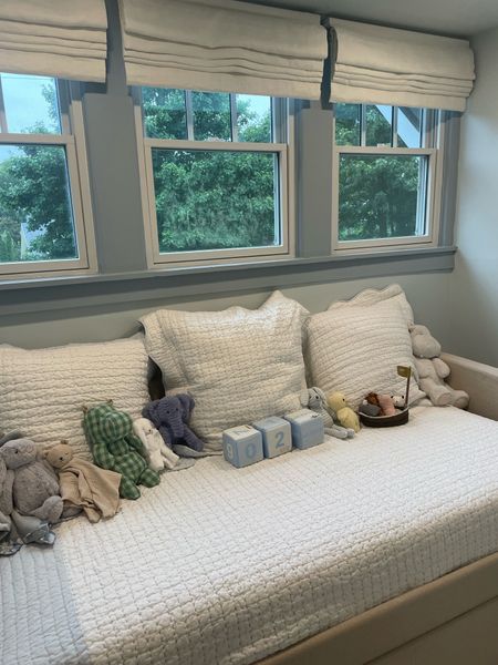 We love having a daybed in our nursery so much. It is the perfect spot to get our son dressed and also just to lay/play/cuddle. This wayfair daybed is a trundle that we are currently using just for extra storage under the bed (total life hack for a small room). The pottery barn blackout shades are the best

Daybed bedding , daybed in baby boy nursery , blue and white twin bedding , blackout shades , nursery decor , wool rug for nursery, milestone blocks , stuffed animal 

#LTKbaby #LTKhome #LTKfamily