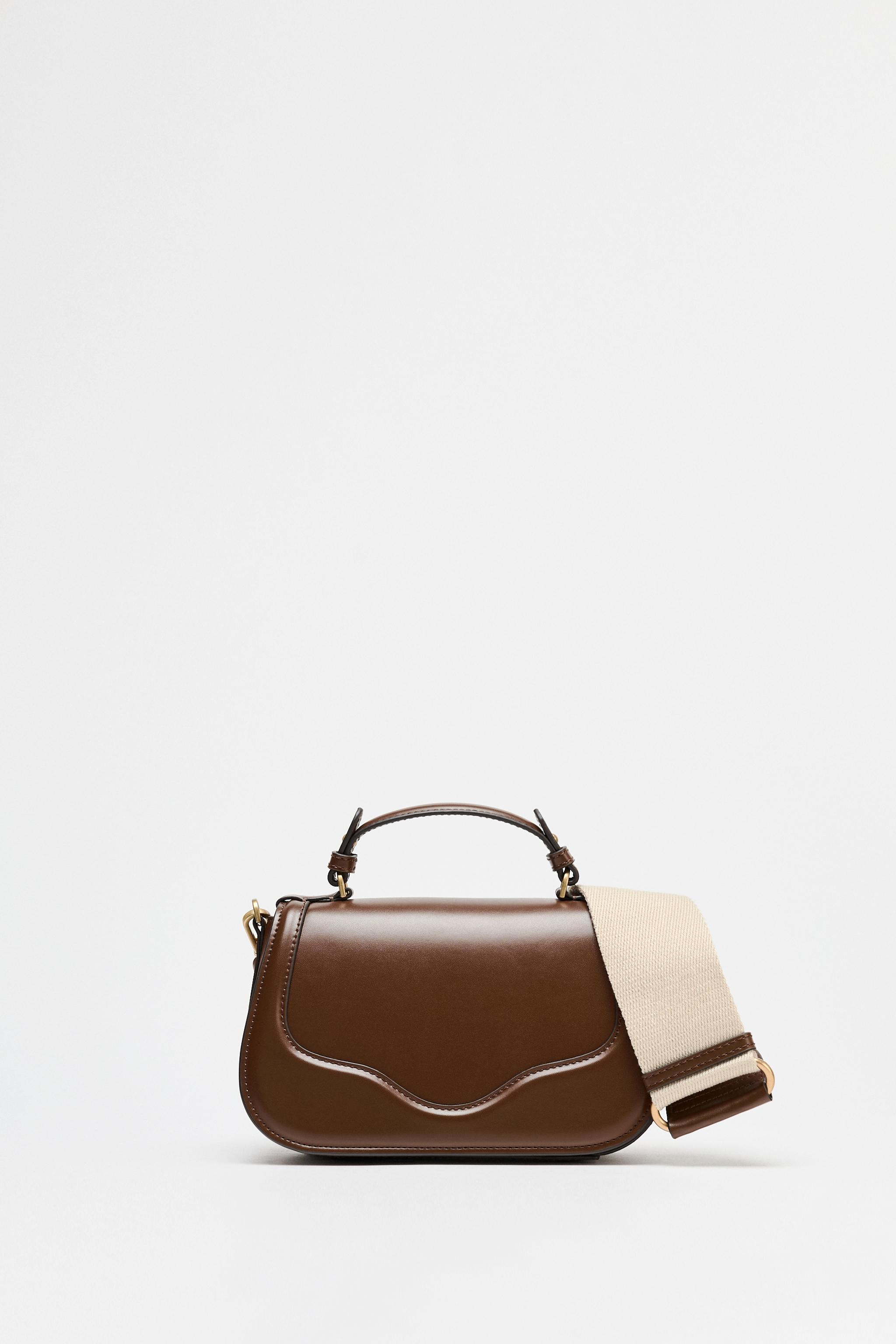 Crossbody bag with flap and top handle. Removable and adjustable straps, one canvas shoulder stra... | Zara US