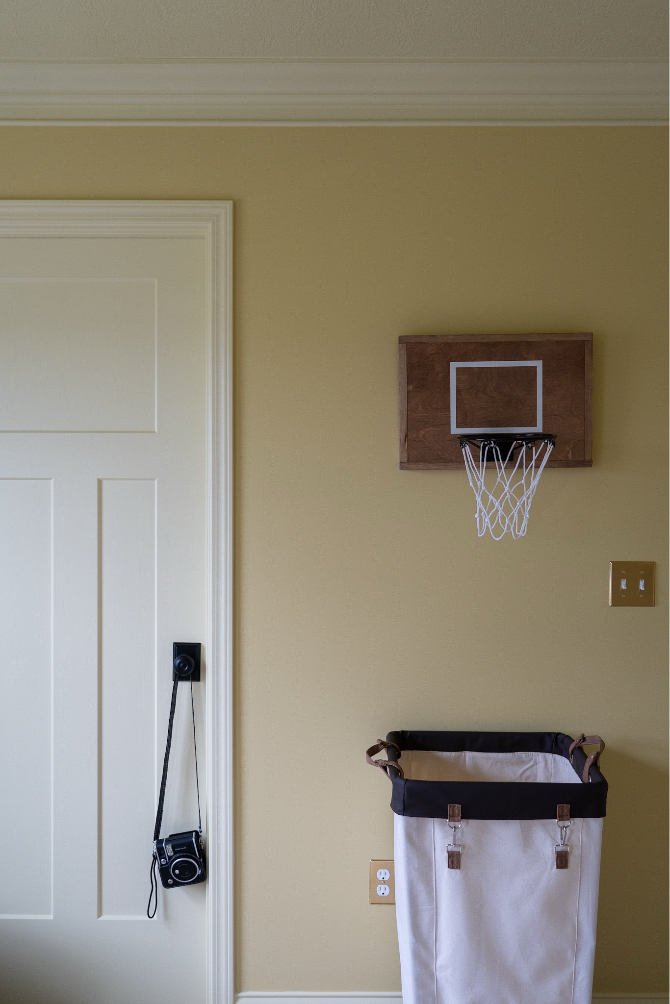 Boys bedroom decor: Basketball hoop, laundry basket, Polaroid camera, switch plate 

#LTKFamily #LTKKids #LTKHome