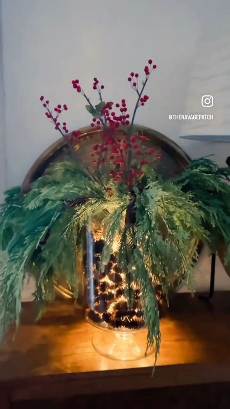 Holiday flower arrangement, Christmas vase arrangement, Christmas home decor, Christmas table top decor, pine cones, greenery and remote controlled lights.
#Christmasdecor #holidaydecor #tabletopdecor #holidayvasearrangement #flowerarrangement

#LTKSeasonal #LTKhome #LTKHoliday