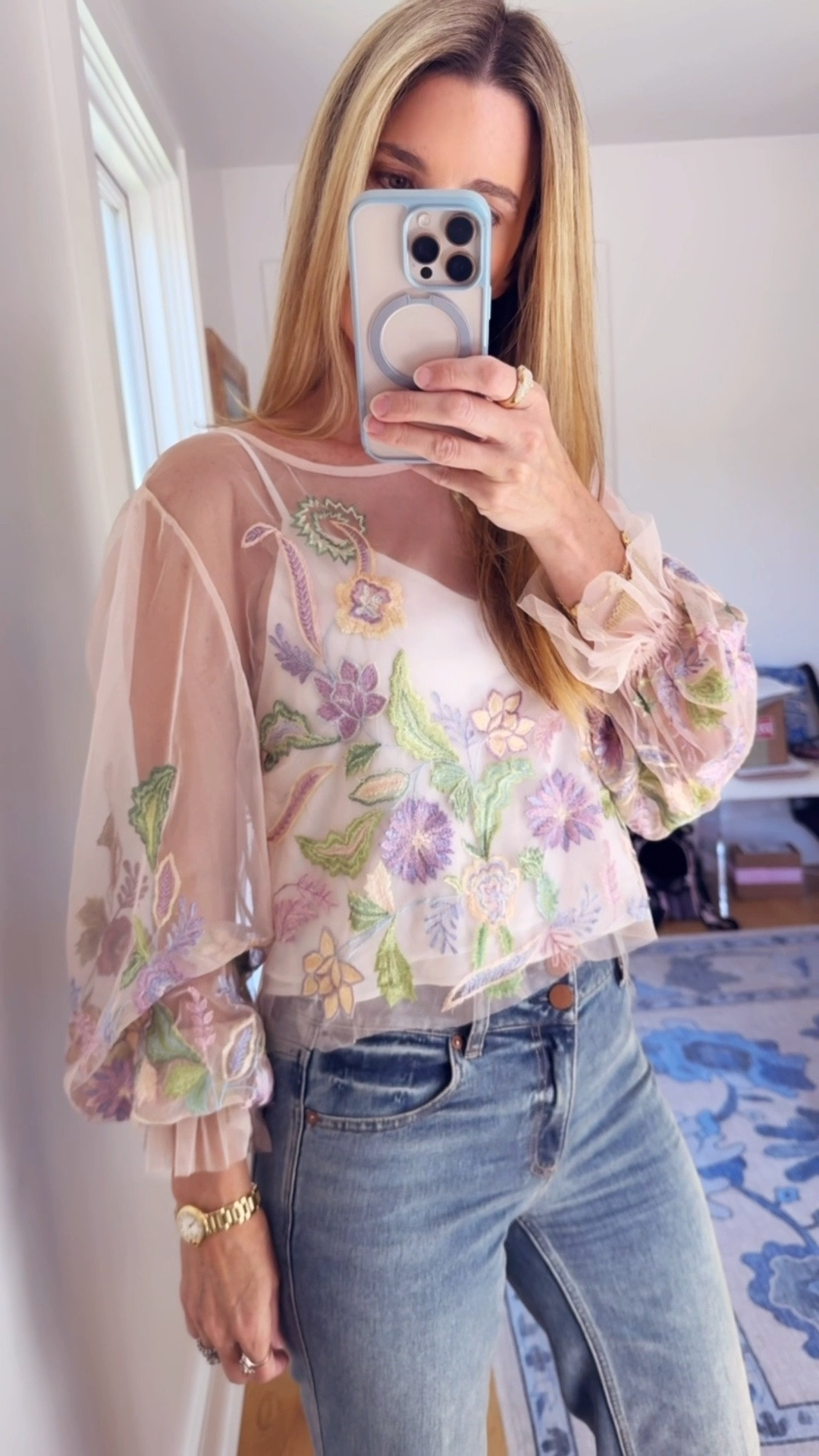 Love this sweet sheer top with floral embroidery- it is under $130 and I a wearing sz M. The cami isn’t sold with this. I am wearing sz 27 in my jeans TTS