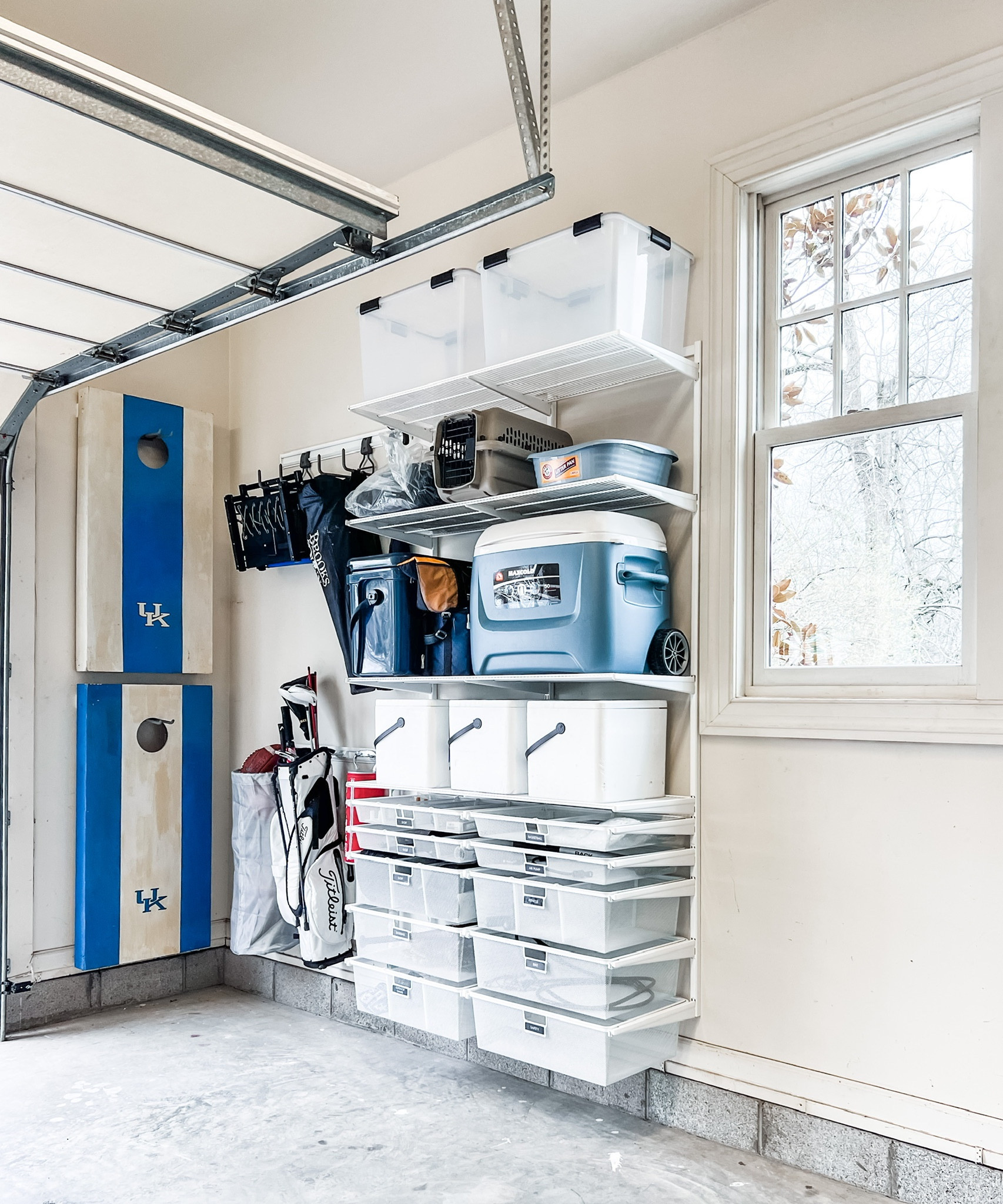 Coolers ready to go for tailgating or fall picnics! The Elfa system is customizable to your needs based on the items you have. These clients wanted their coolers easy to reach so we were able to adjust the shelving to accommodate.

#LTKSeasonal #LTKFind #LTKhome