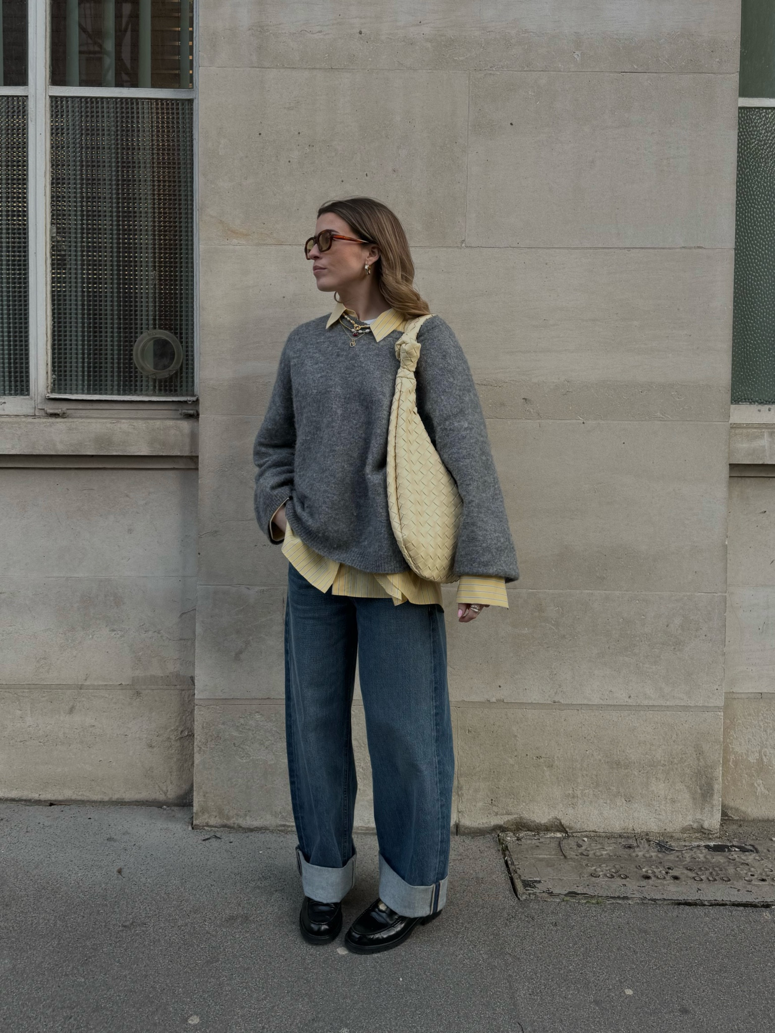 Grey arket jumper, oversized jumper, yellow shirt, yellow stripe shirt, spring outfit, spring fashion, Anthropologie bag, woven bag, yellow bag, citizens of humanity jeans, baggy jeans, loafers, loafers outfit 

Exact shirt is Zara 



#LTKeurope #LTKstyletip #LTKSeasonal