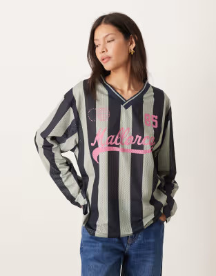 ASOS DESIGN long sleeve soccer style top with mallorca graphic in charcoal stripes | ASOS (Global)