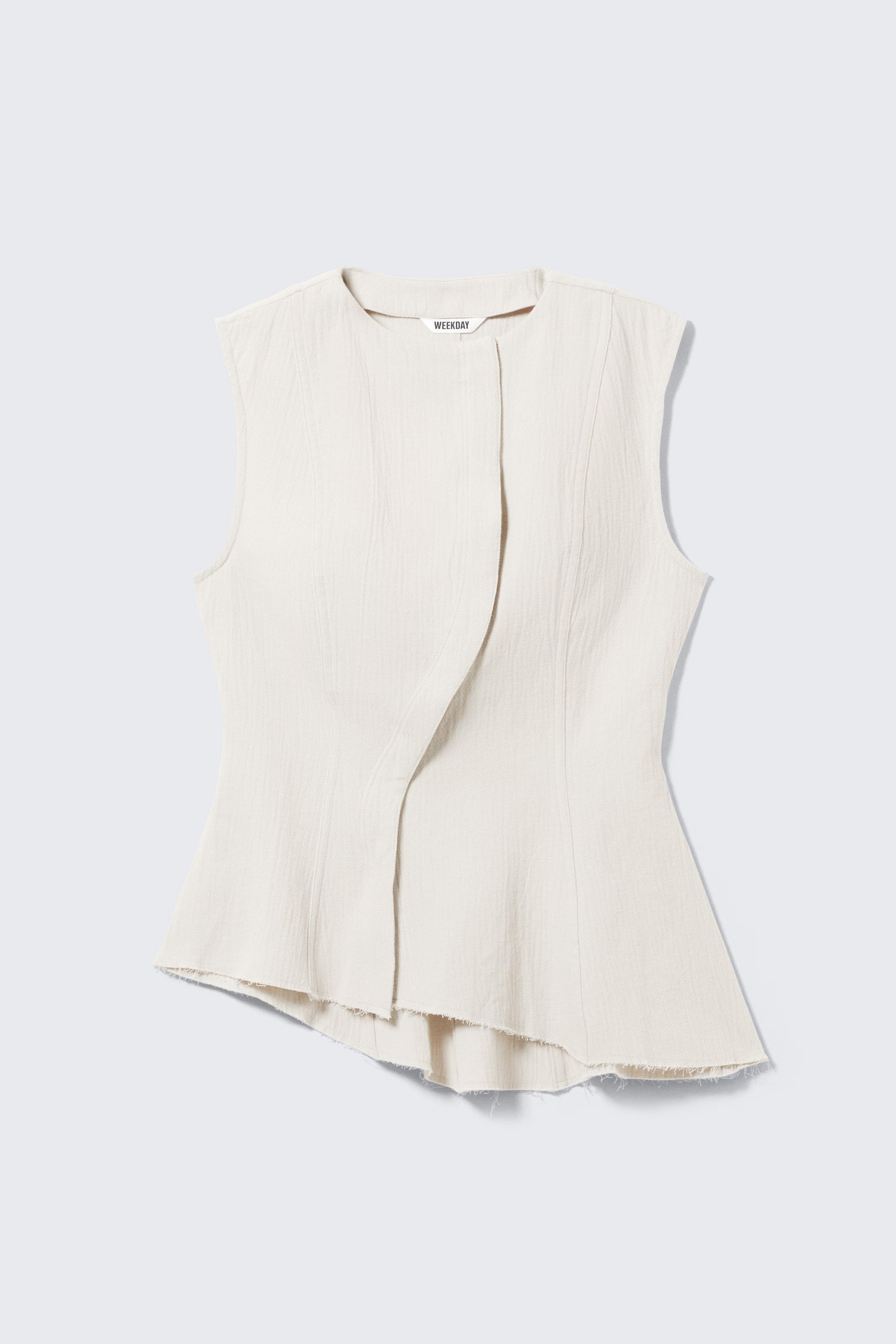 Haut péplum asymétrique sans manches | H&M (FR, IT, ES, PT, BE)