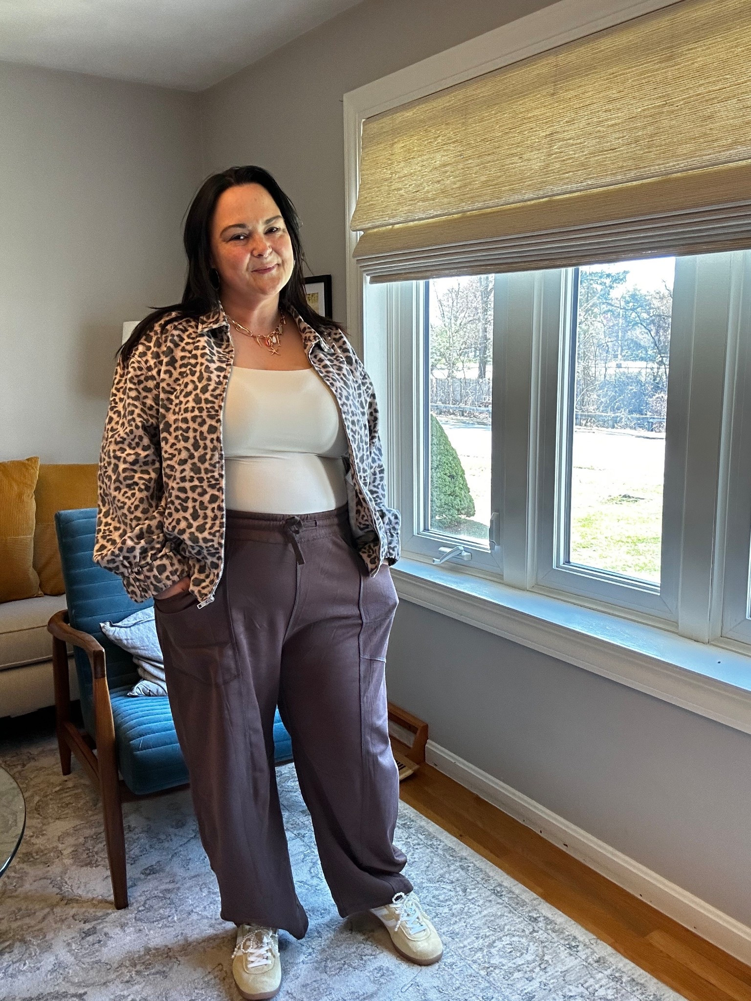 Midsize ootd with true to size wide leg pants, a fitted tank, and a leopard print jacket. This comfortable outfit is easy, flattering, and perfect for real life—especially for errands or casual days out. The relaxed fit pants keep it comfortable, while the fitted tank and statement layer pull the whole look together. A go-to everyday outfit formula for midsize women.

#LTKootd #LTKMidsize #LTKOver40