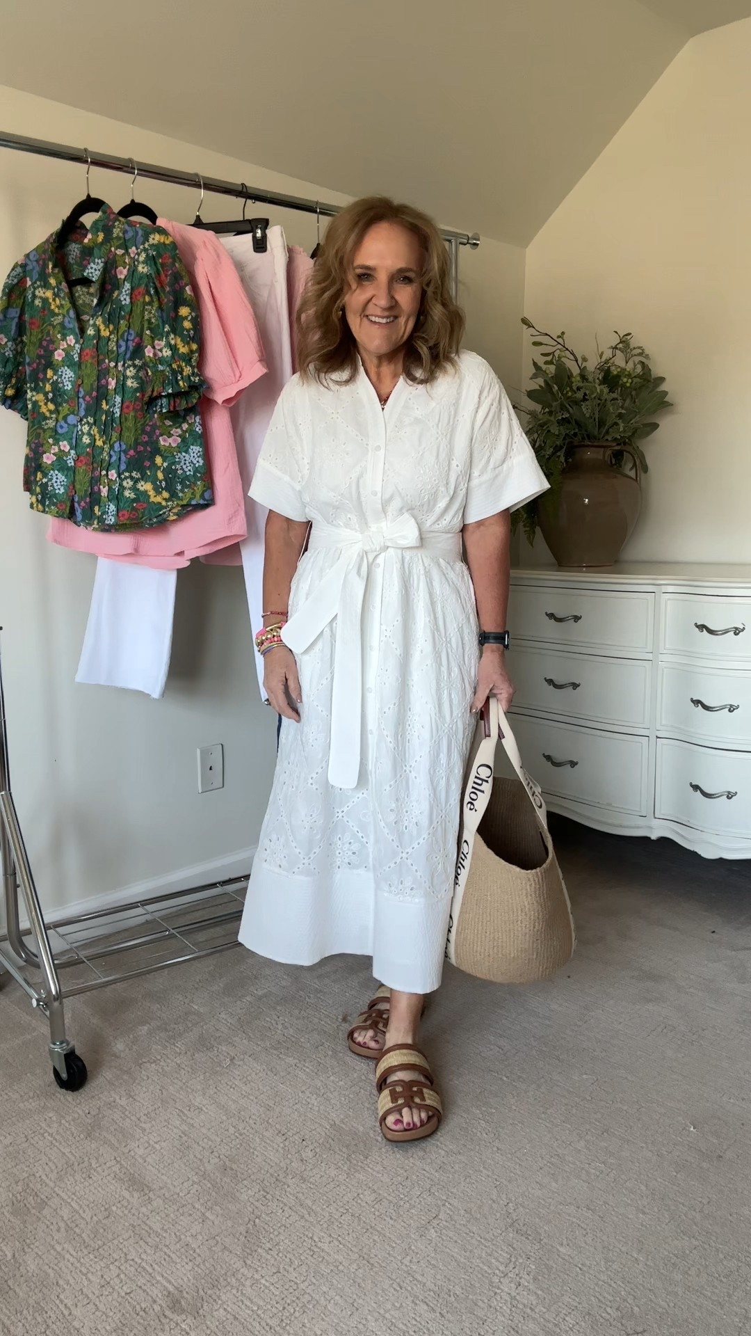 Eyelet dress is stunning. Wearing a medium and I’d say it runs a little big. Code NANETTE15 15% off 

Chloe bag at a discount off retail! This is the site I ordered from. 

Sam Edelman slides I wore them all last summer and love them! True to size. 

White dress vacation drsss beach pictures dress designer tote splurge worthy 

#LTKOver40 #LTKShoeCrush #LTKItBag