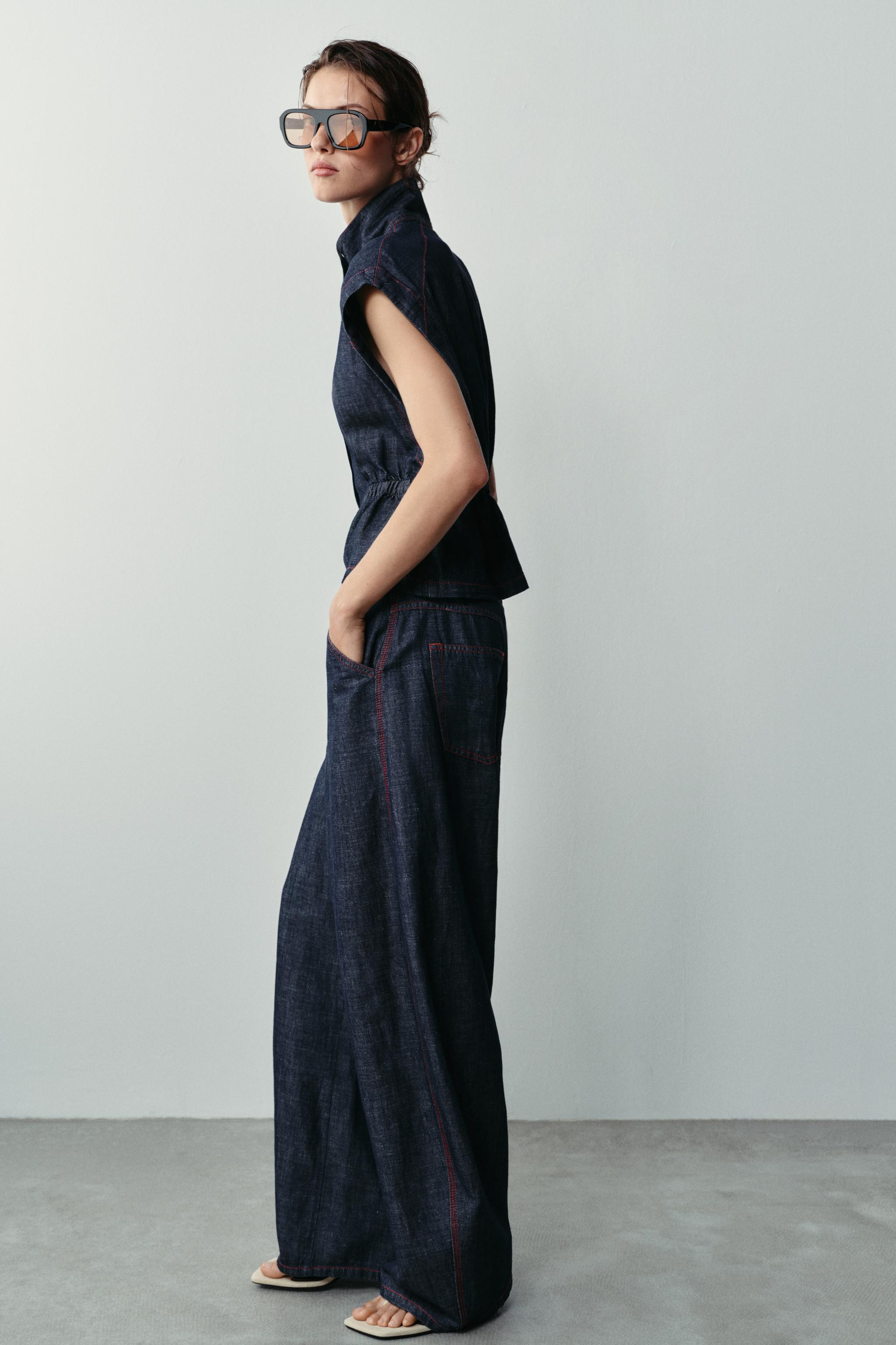Weste aus Leinen. Hoher Kragen, \u00e4rmellos. Ziern\u00e4hte in Materialkombination. Elastischer... | Zara DE