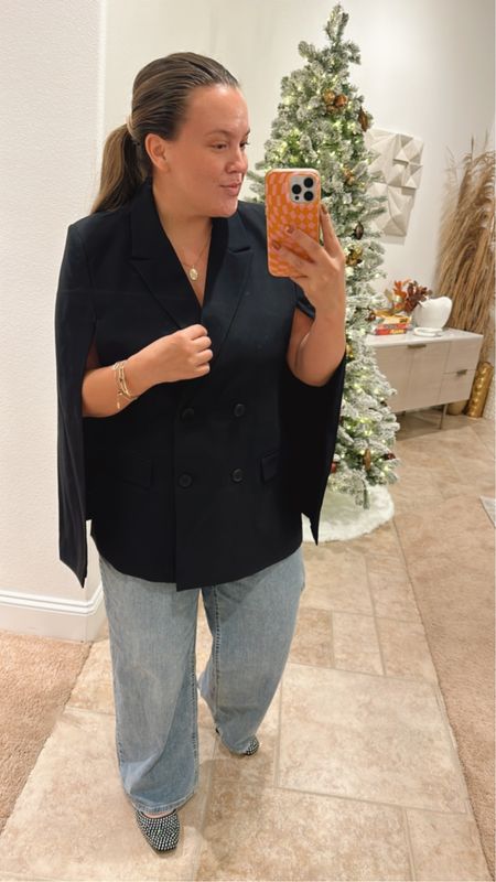absolutely buy this blazer cape before it sells out! it’s under $50. looks super sexy alone but can wear a long sleeve under it or a cute turtleneck bodysuit! i’m in size large! ballet flats fit TTS 

#LTKmidsize #LTKSeasonal #LTKHoliday