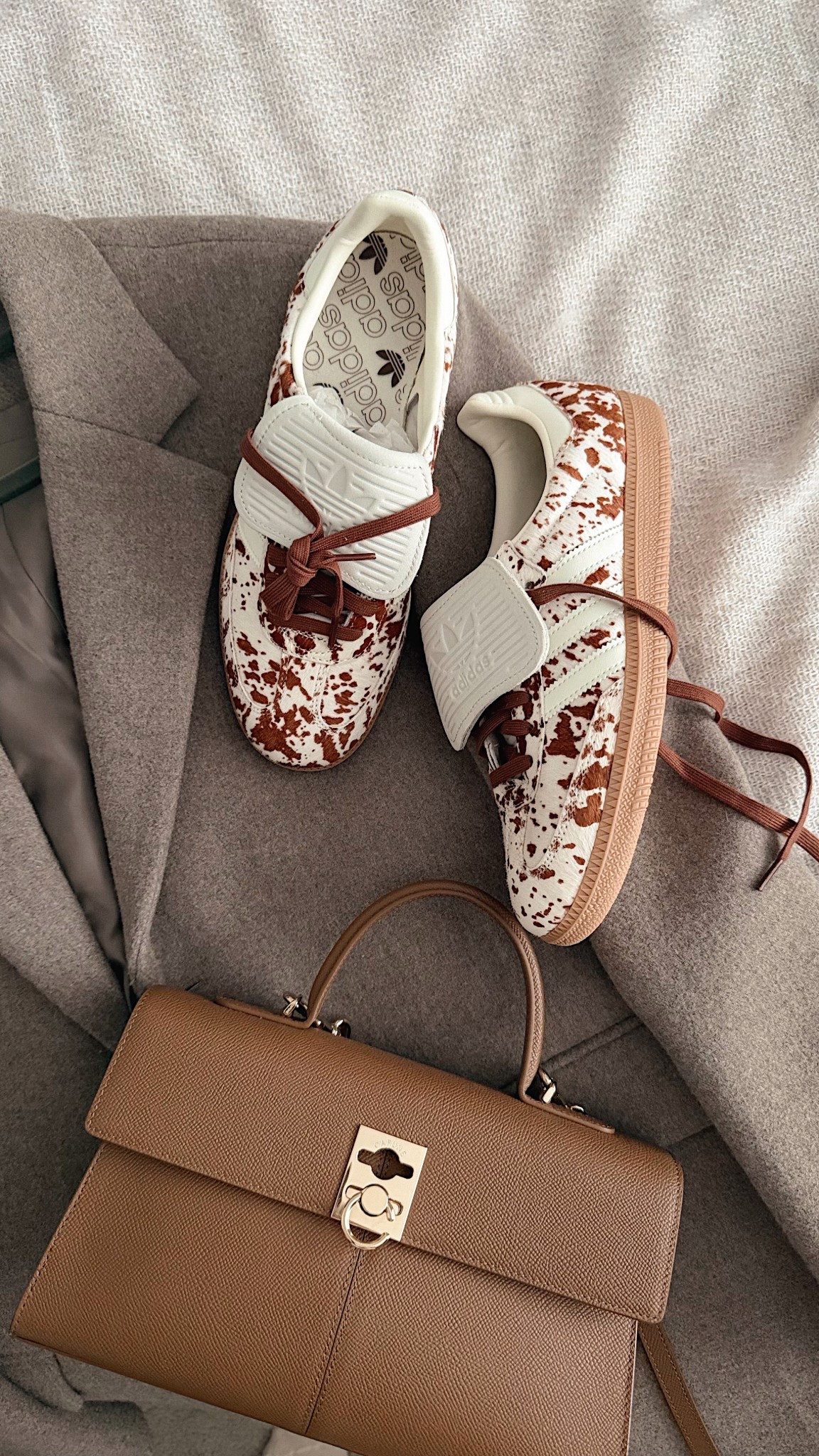 I kept the adidas cow print samba lt ytrainers which are on Black Friday sale under £70 🐮 #blackfriday #adidas 

Cafune stance bag - brown leather handbag 10% off 

Trending trainers - cow print sneakers 

#LTKbag #LTKCyberWeek #LTKshoes