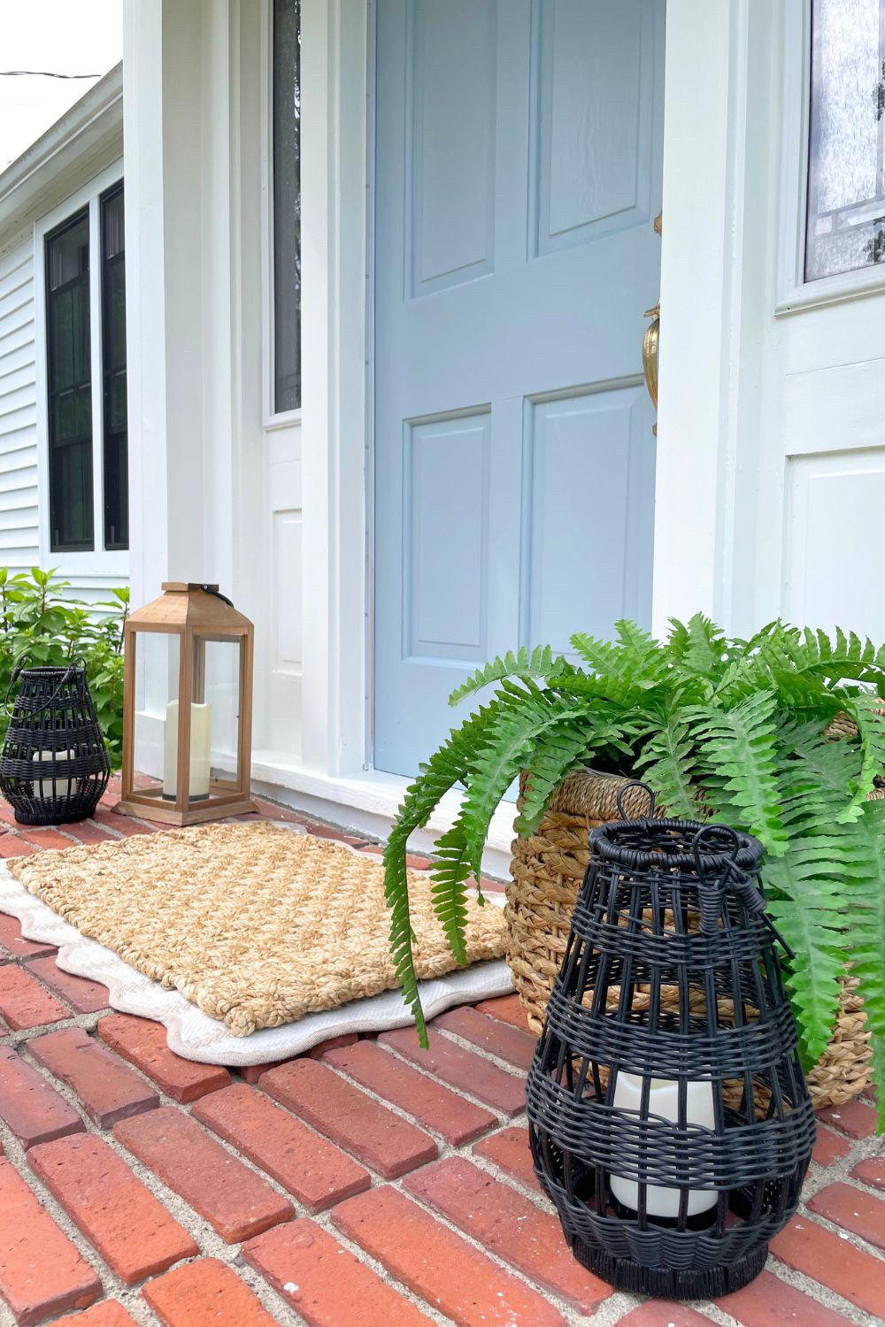You can still grab this adorable (and affordable) scalloped layering rug which pairs perfectly with this smaller jute doormat! My lanterns are sold out but I'm linking similar ones here. 

Paint color details on the blog: www.tantrumsandtools.com/light-blue-front-door-color 

Modern farmhouse, coastal, cottage, porch decor, outdoor decor, american flag, curb appeal 

 

#LTKSeasonal #LTKHome #LTKStyleTip