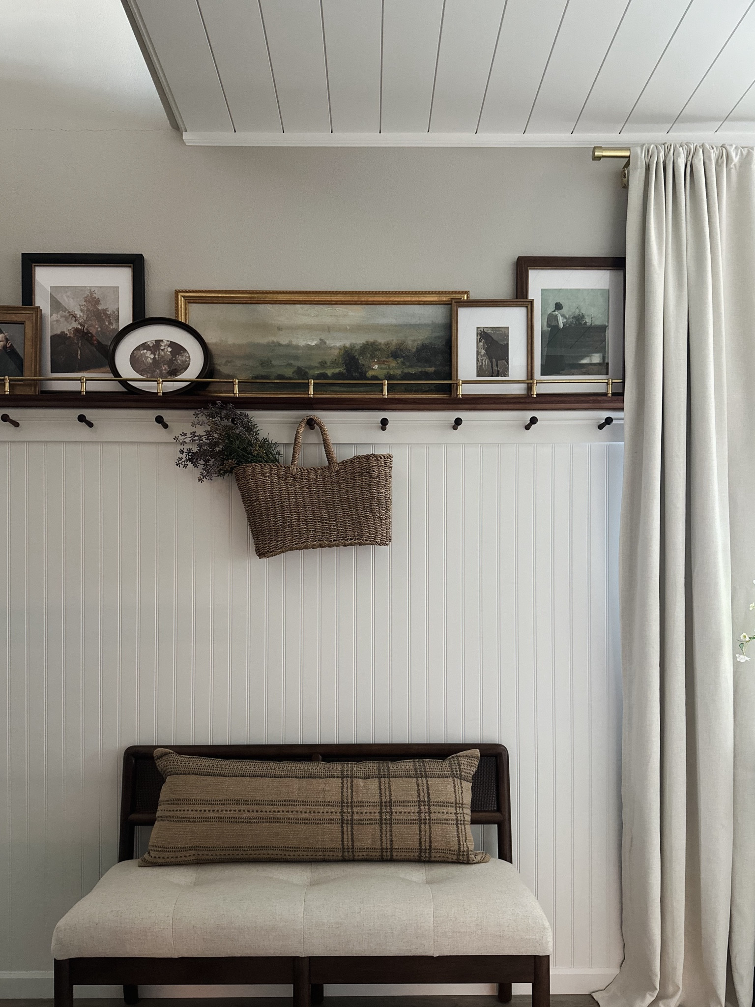 Entryway brass and walnut picture rail with fall art

#LTKHome #LTKSeasonal #LTKStyleTip