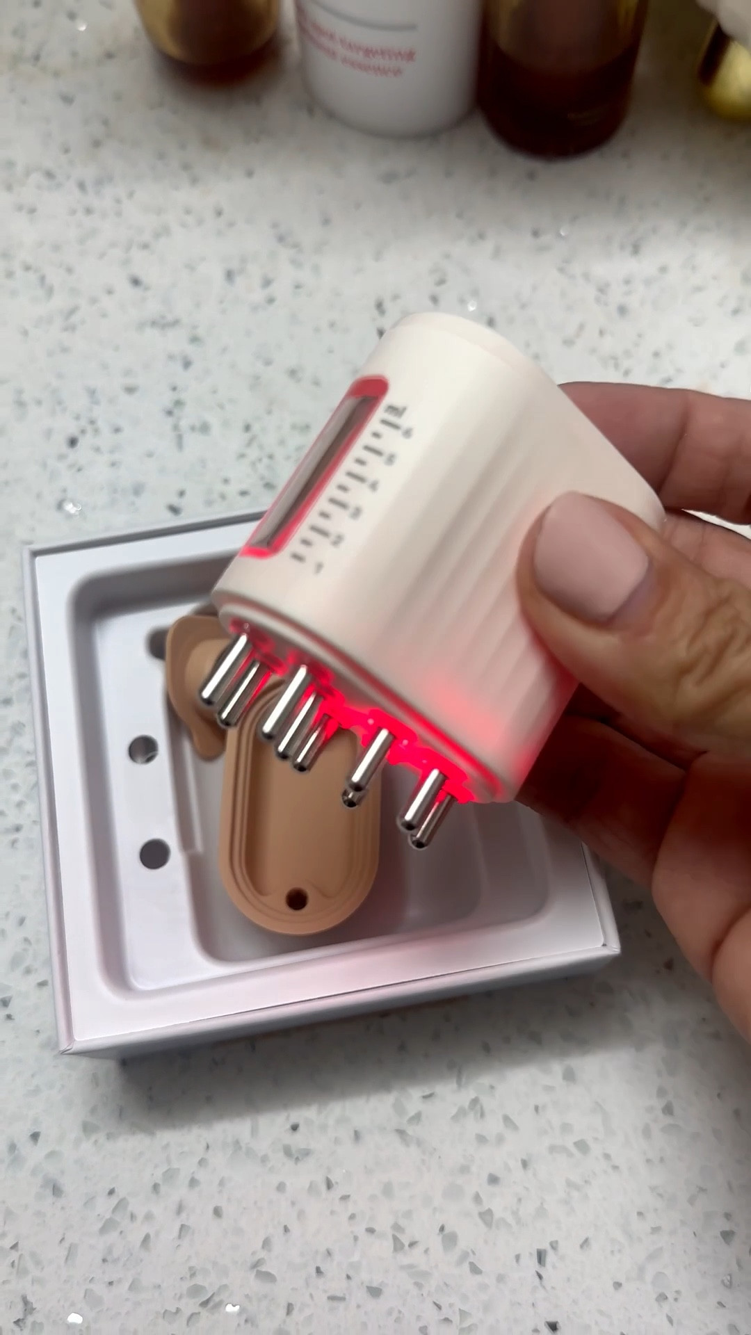 This red light scalp massager has become a total essential in my hair routine. It features a built-in oil chamber that releases your favorite hair oil while it massages, leaving the scalp nourished and the hair softer and shinier.

The red light helps stimulate growth, boost circulation, and strengthen the roots. It feels like a mini spa treatment at home and is amazing for dry scalp or tension at the end of the day.

Simple, effective, and super easy to use — your hair will love this.


#LTKBeauty #LTKGiftGuide #LTKFindsUnder100