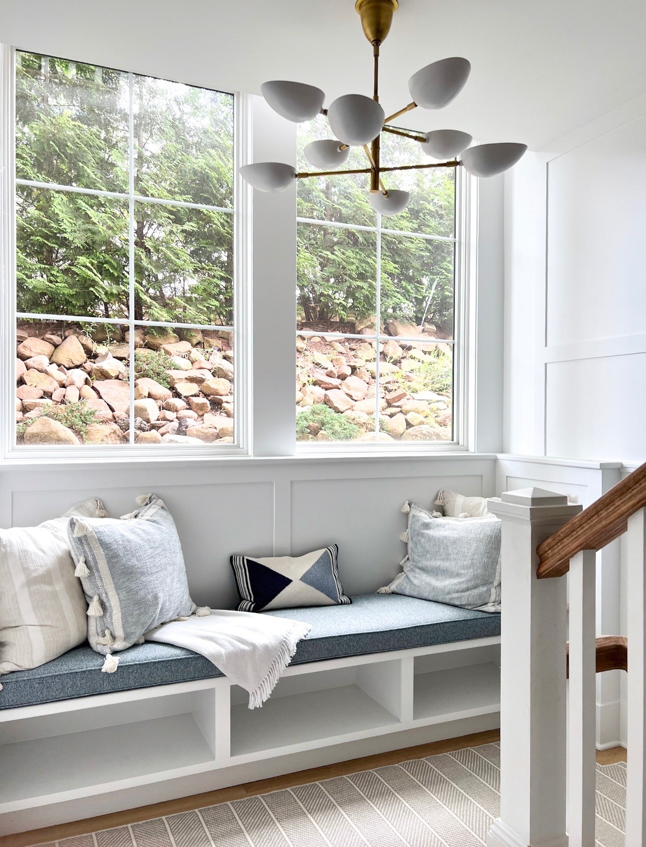 Sometimes a staircase needs its own little moment ✨

This stairway has the most incredible natural light so we wanted to create a cozy nook where the family could sit and read or hangout. A custom bench with cushion, throw pillows and blankets and of course a statement chandelier. The runner (which goes up three floors!) is the star of the show 🙌🏻

#LTKHome #LTKdayinmylife #LTKstorytime