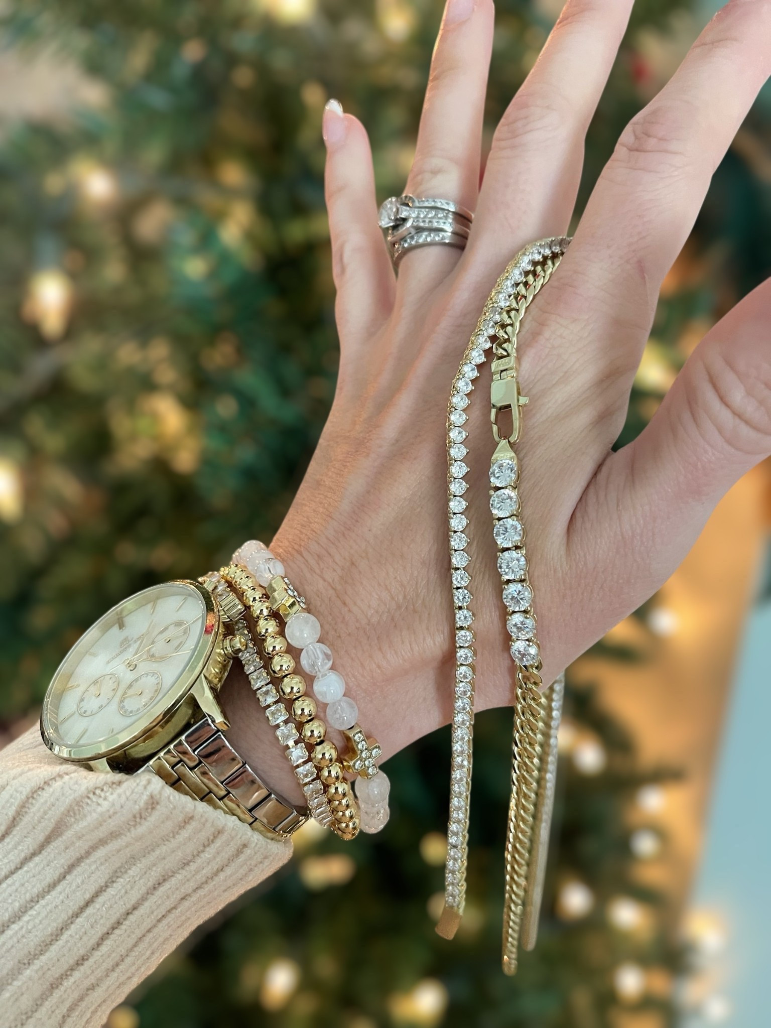 The Ultimate Giftable Jewelry Stack ✨

If you’re looking for luxe-looking, gift-ready jewelry, this curated stack is such a winner. My Melinda Maria necklaces — the Baby Julian Loves Diamonds and the Not Your Basic Tennis Necklace — are two of my most-worn pieces. They layer beautifully, look high-end, and make the perfect gift for moms, sisters, besties, or anyone who loves a touch of sparkle. They’re timeless, elegant, and feel so special unboxed.

I paired them with my BaubleBar stacking bracelets (currently $10 each!) which are the easiest, cutest gifts for teachers, teens, coworkers, and stocking stuffers. You can personalize a stack with initials, sparkle, pearls, or beads — fun to gift and even more fun to receive. My gold pearl-link watch ties everything together for a polished everyday look.

This whole jewelry mix feels thoughtful, pretty, and perfectly giftable — whether you’re grabbing one piece or creating a full stack.

Gifting inspo: Melinda Maria jewelry, layering necklace gifts, tennis necklace layering ideas, BaubleBar $10 bracelets, affordable jewelry gifts, stocking stuffers for her, teacher gifts, coworker gifts, classic gold jewelry, holiday gifting, sparkly accessories, everyday necklace stack.

#LTKCyberWeek #LTKGiftGuide #LTKHoliday