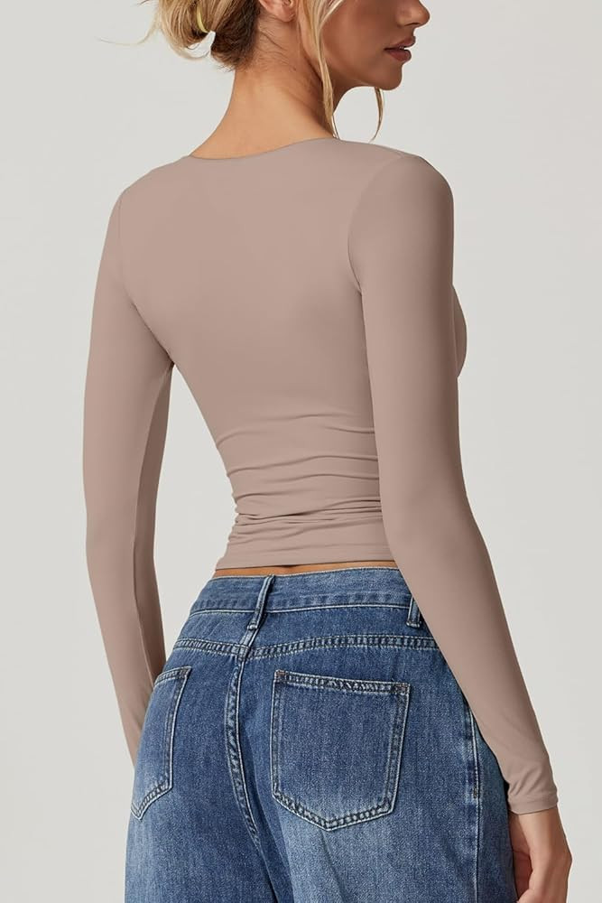 QINSEN Women's Long Sleeve V Neck T Shirts Double Lined Crop Top Seamed Cup Going Out Tops | Amazon (US)