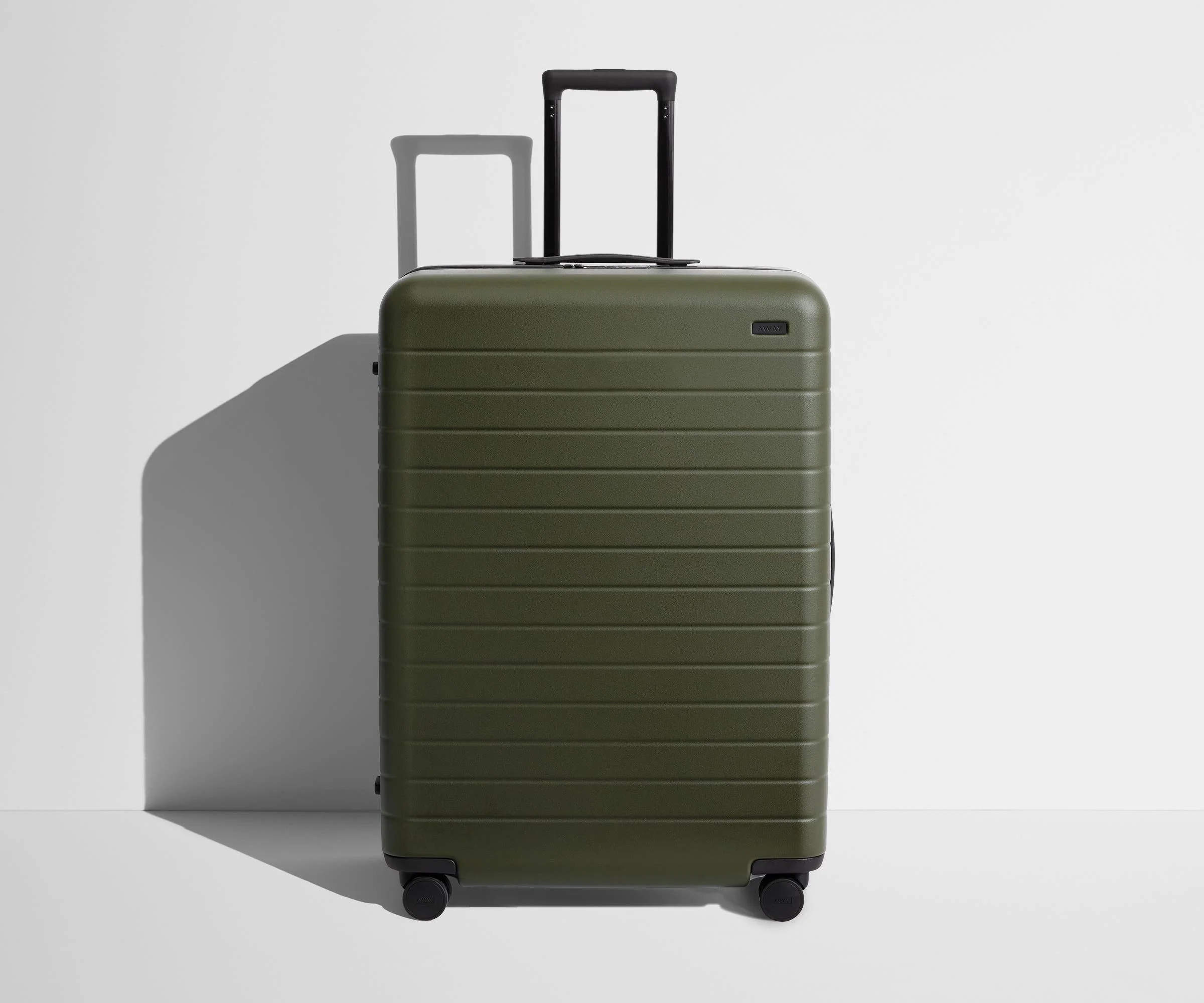Shop Large & Checked Suitcases in Olive Green | Away | Away