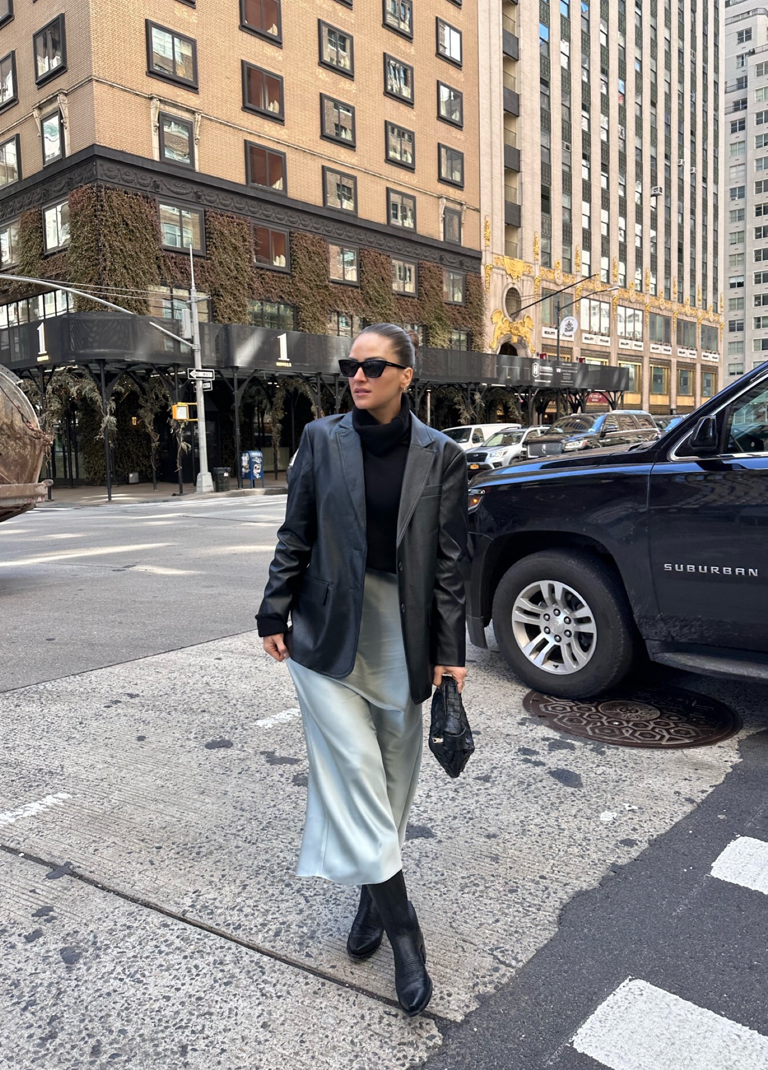 I’m loving this satin midi skirt! The color is perfect for spring & can be styled so many ways. I’m wearing a size S I’m everything. // spring outfit, spring outfits, satin midi skirt, leather blazer 