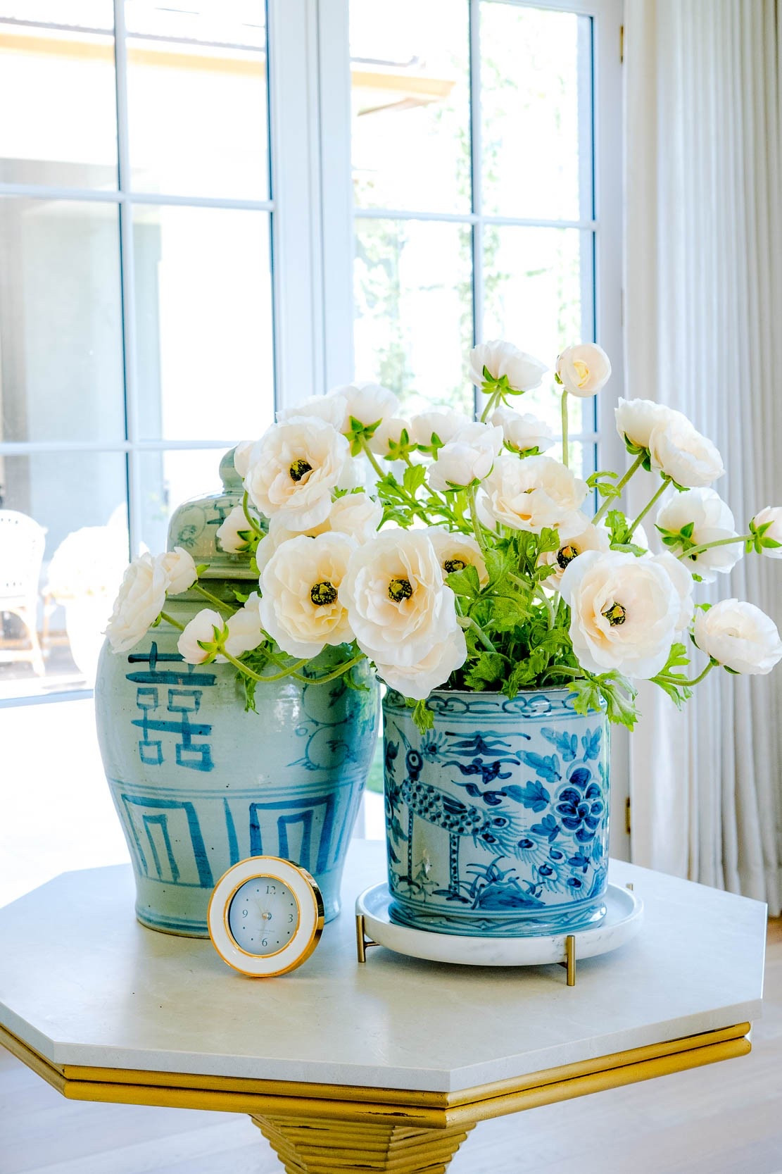 The most gorgeous faux ranunculus in my favorite blue and white planter. I used 12 stems in my vase.

#LTKHome