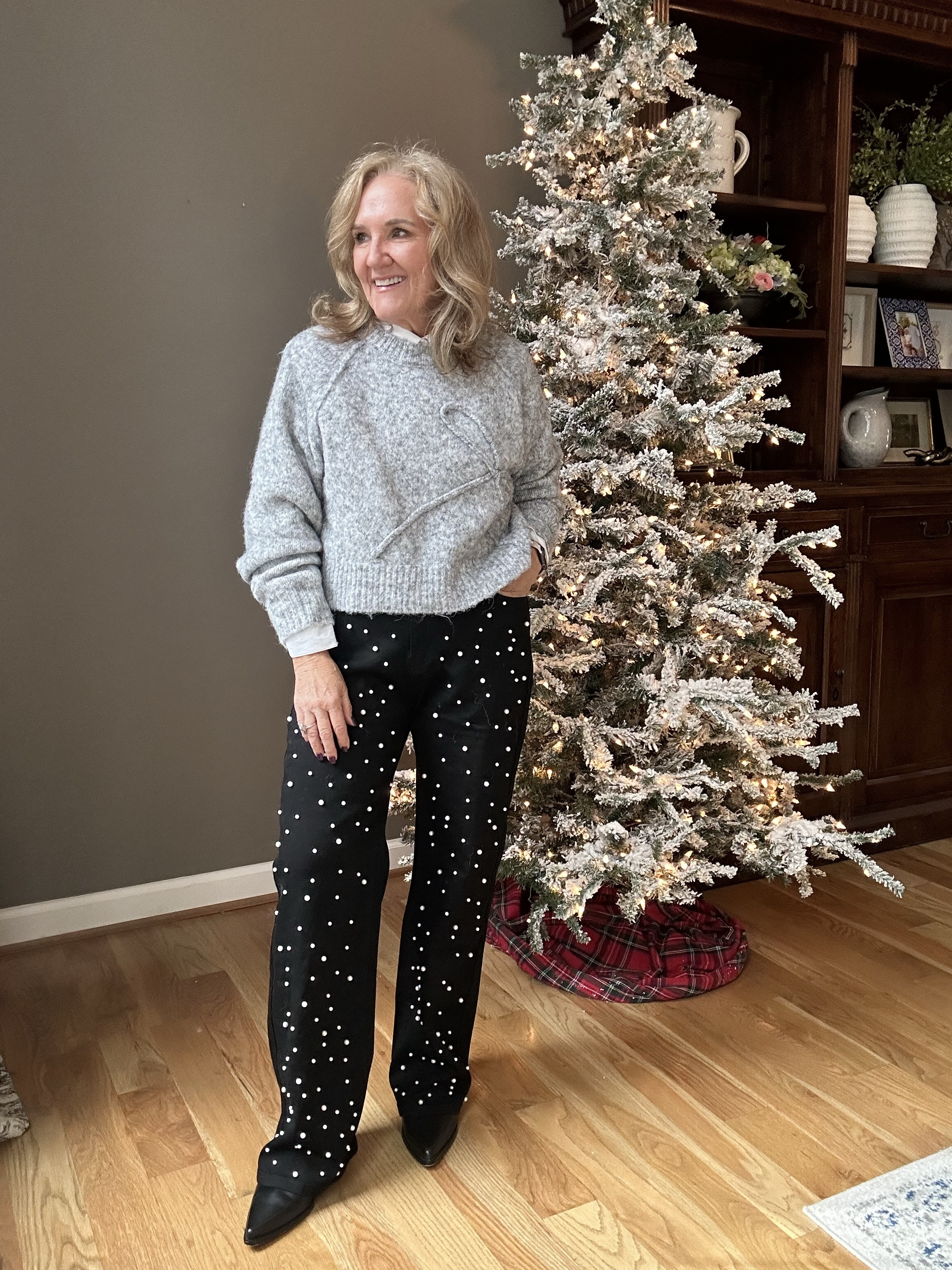 Super cute bow sweater. Soft light-ish weight but warm. I sized up. It’s cropped but fine with a high waisted pant or on 5’3” me! 

Jeans size large. There’s stretch so you decide how you want to wear them. More fitted? Order regular size. 
Boots you must size up a full size. They’re waterproof. 

Holiday outfit winter outfit American eagle sweater Amazon jeans pearl jeans black straight leg jeans 

#LTKOver40 #LTKMidsize #LTKHoliday