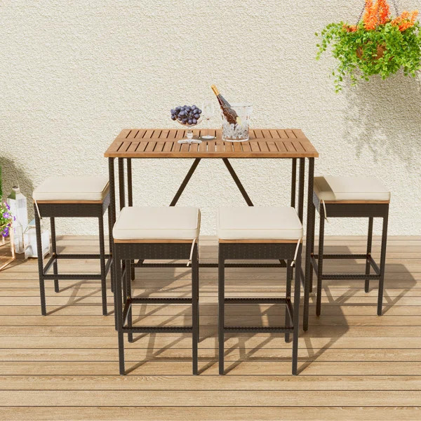 Dariean 4 - Person Rectangular Outdoor Dining Set with Cushions | Wayfair North America