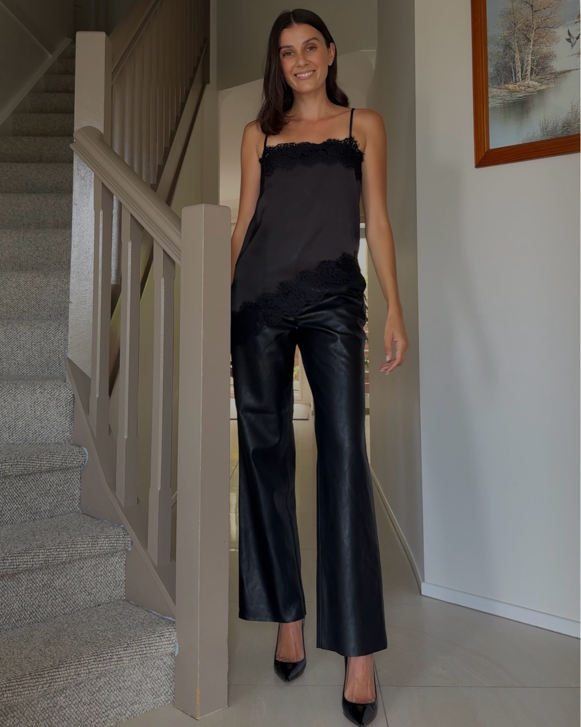 A classic all black outfit pairing lace and faux leather 🖤 Pants and cami are both from Portmans (size8). Heels are Christian Louboutin.