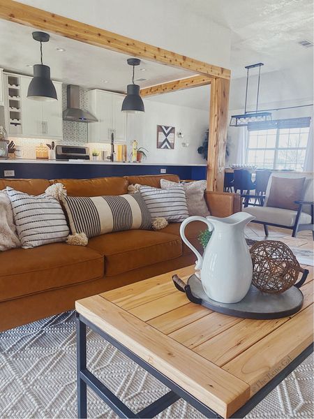 Living room styling! 

Farmhouse living room decor, cognac couch, leather couch, white rug, boho rug, white decor, modern farmhouse decor, couch, modern chairs, white chair

#LTKfindsunder100 #LTKhome #LTKsalealert