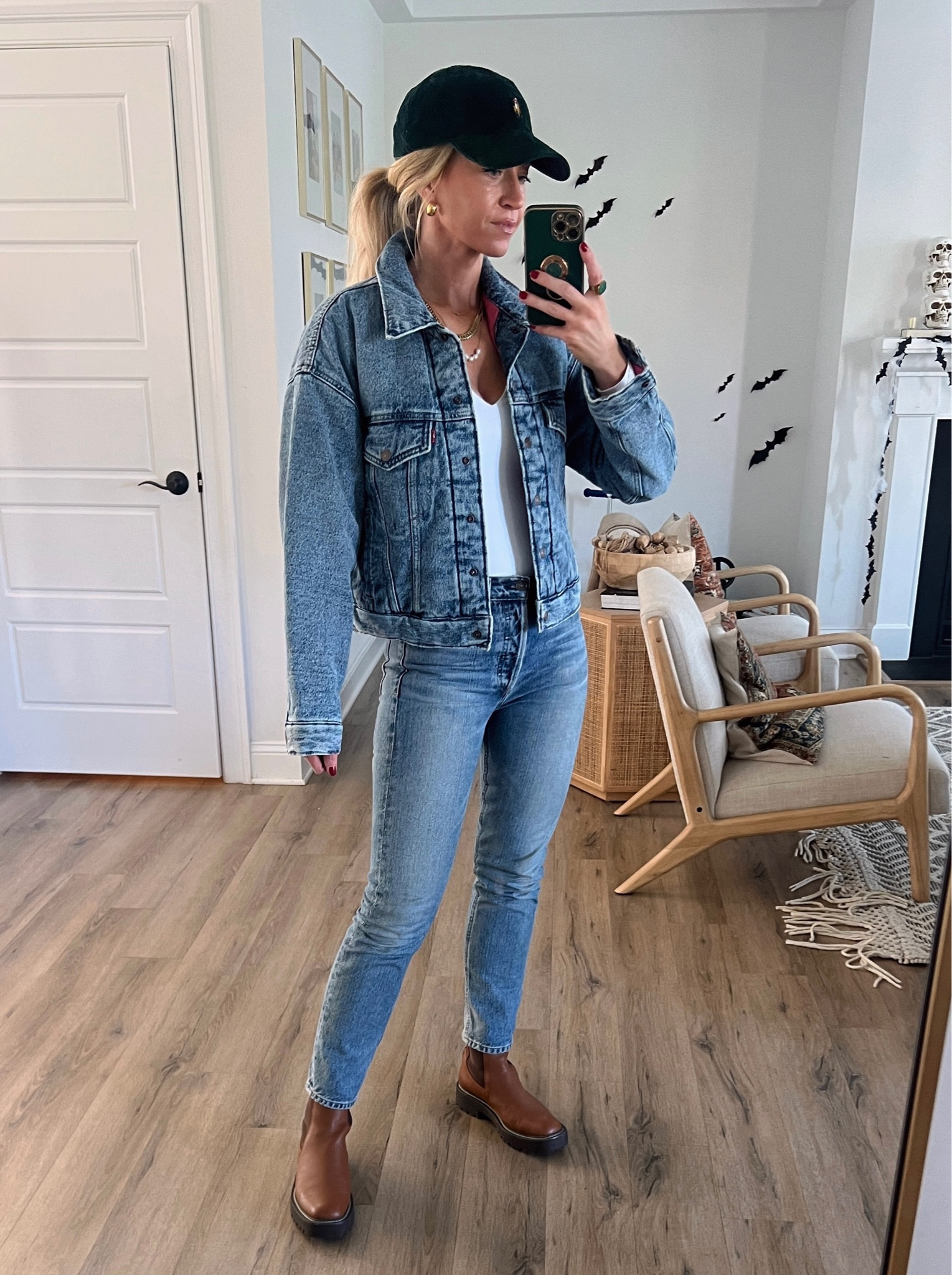 Denim on denim - cropped puffer denim jacket (wearing a small ) + straight leg denim + cognac boots  

#LTKstyletip #LTKtravel #LTKSeasonal