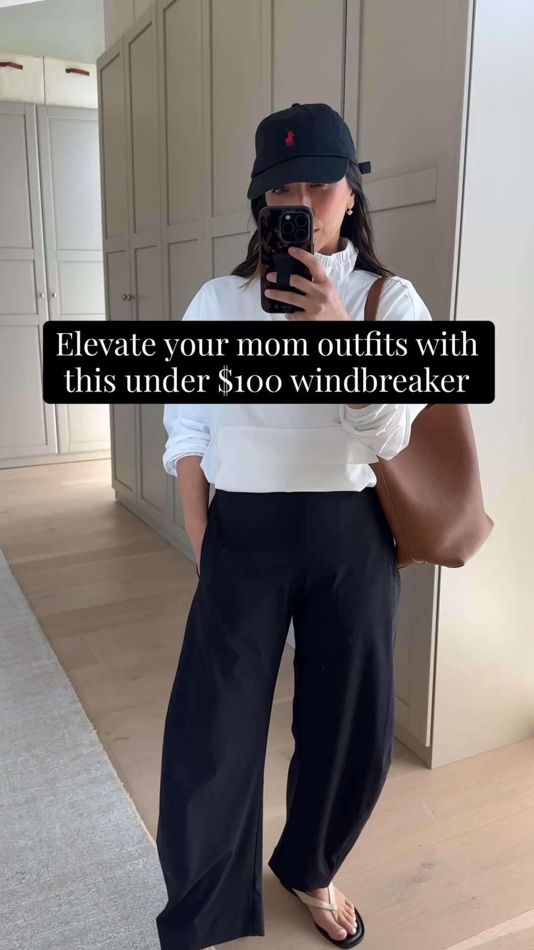 Low effort high reward school drop off outfit. 

Zella windbreaker xs
Everlane box cut tee medium
Ruti pants petite 4
Everlane Leather sandals 5
Quince bucket bag
Polo hat 
Electric picks earrings
Electric Picks necklace 

Athleisure, mom style, spring outfits 2026

#LTKmomlife #LTKootd #LTKPetite