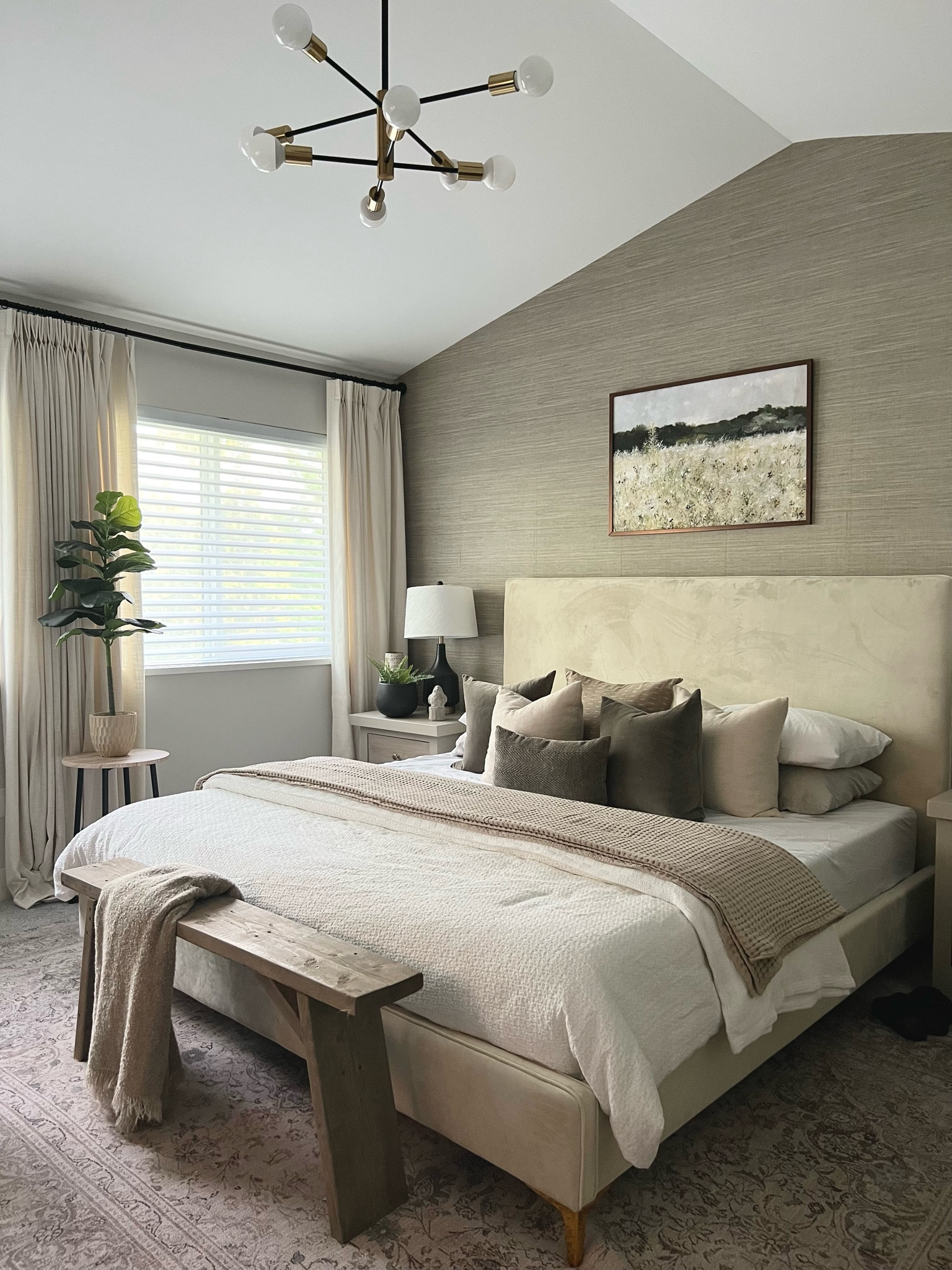 Primary bedroom- window treatments: motorized blinds and linen look curtains. 