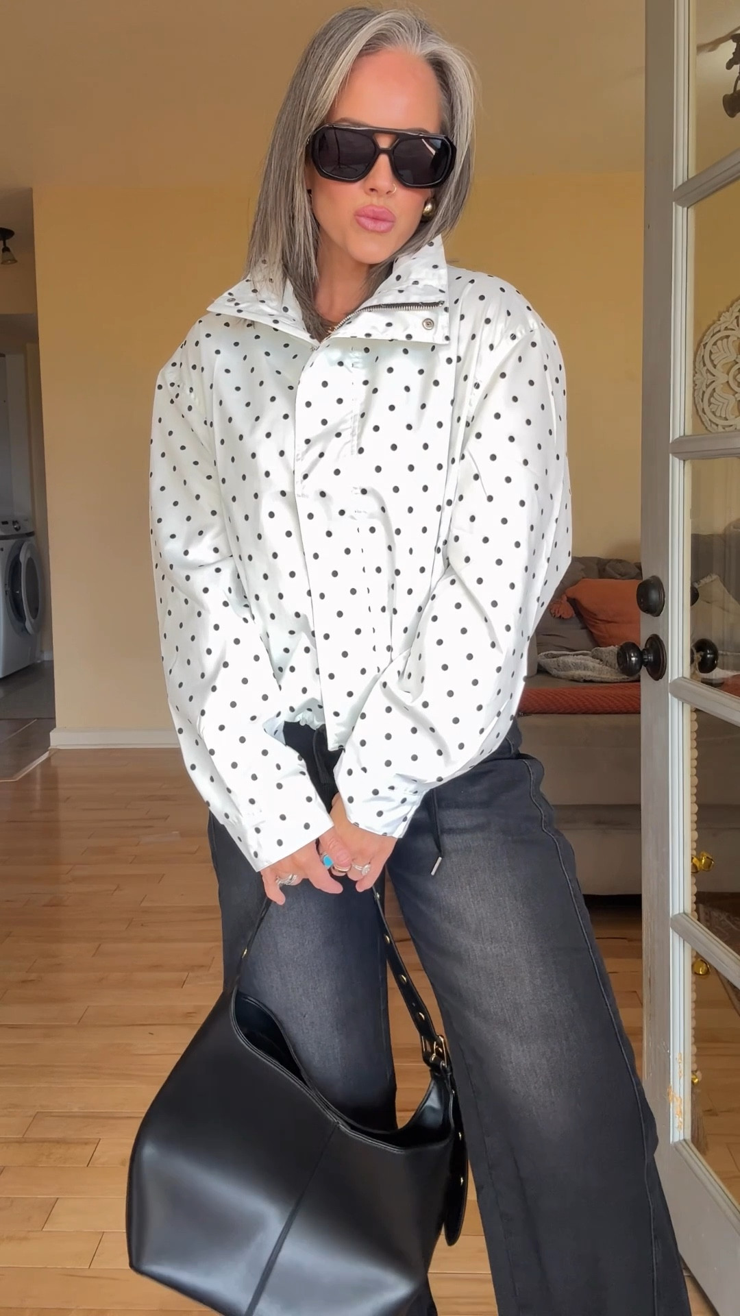 This polka dot jacket is adorable! Hurry bc it’s on sale! It reminds me of the material of a rain coat. Perfect for a chilly, rainy spring day! I sized up to a medium. Would have been fine in a small too. Jeans in my true size 4, they do stretch out a bit as you wear them. 
#polkadots #trendy #2026trends #barreljeans #jacket #momstyle #millennialfashion 