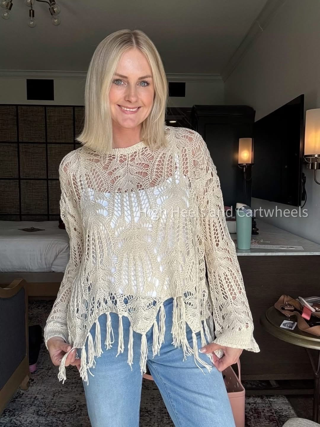 I found this cute crochet top off Amazon and have been layering it with a tank. Easy way to dress up your outfits!